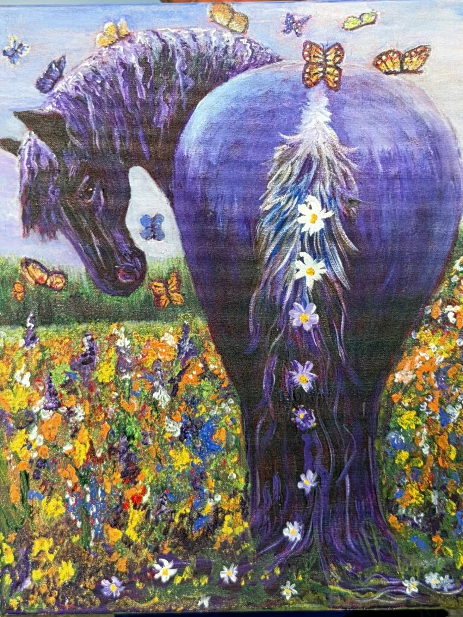 Daisies and Butterflies. A black mare stands in a field full of wildflowers while butterflies dance about.