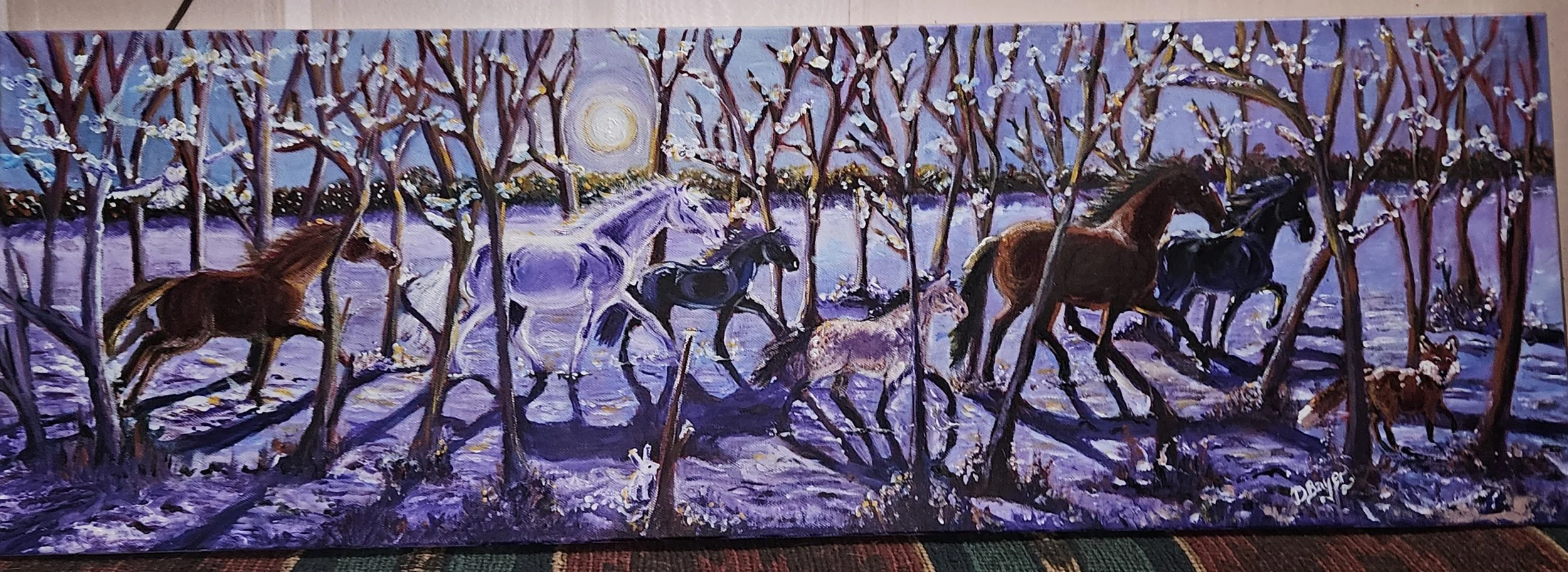 A winter escape. Horses and ponies gallop free under the full moon of winter casting long shadows. They have startled up a white rabbit, an owl and a fox.
