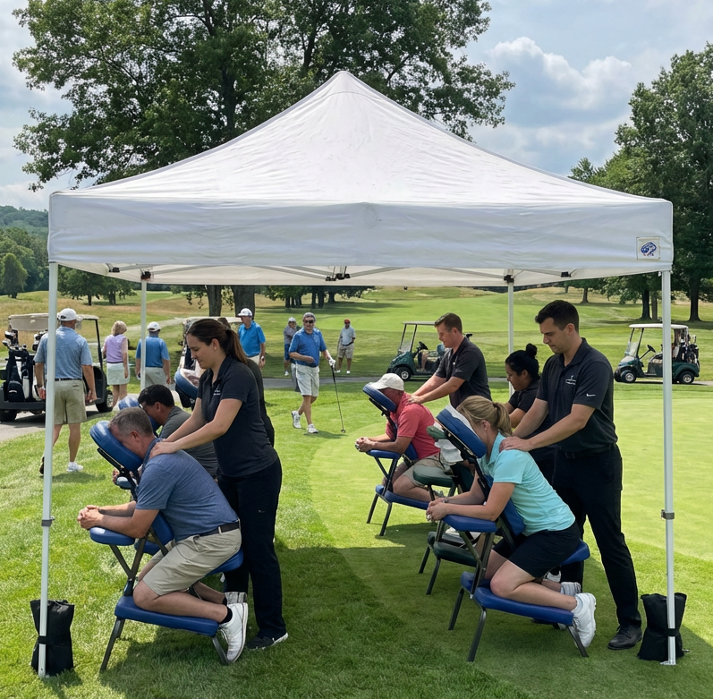 Boston Pops Chair Massage under a tent at the golf course gold tournament for charity.