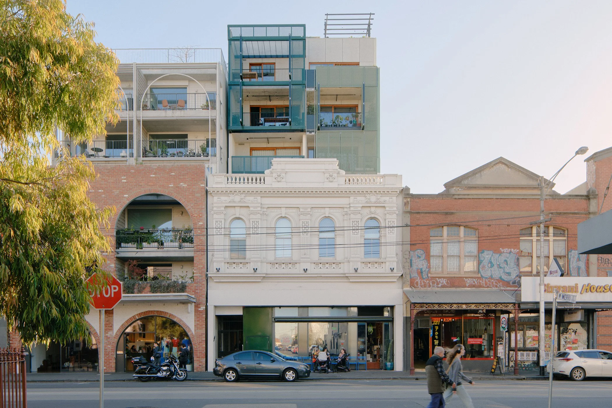 A high street picture of Moorabbin, Melbourne with cars and pedestrians