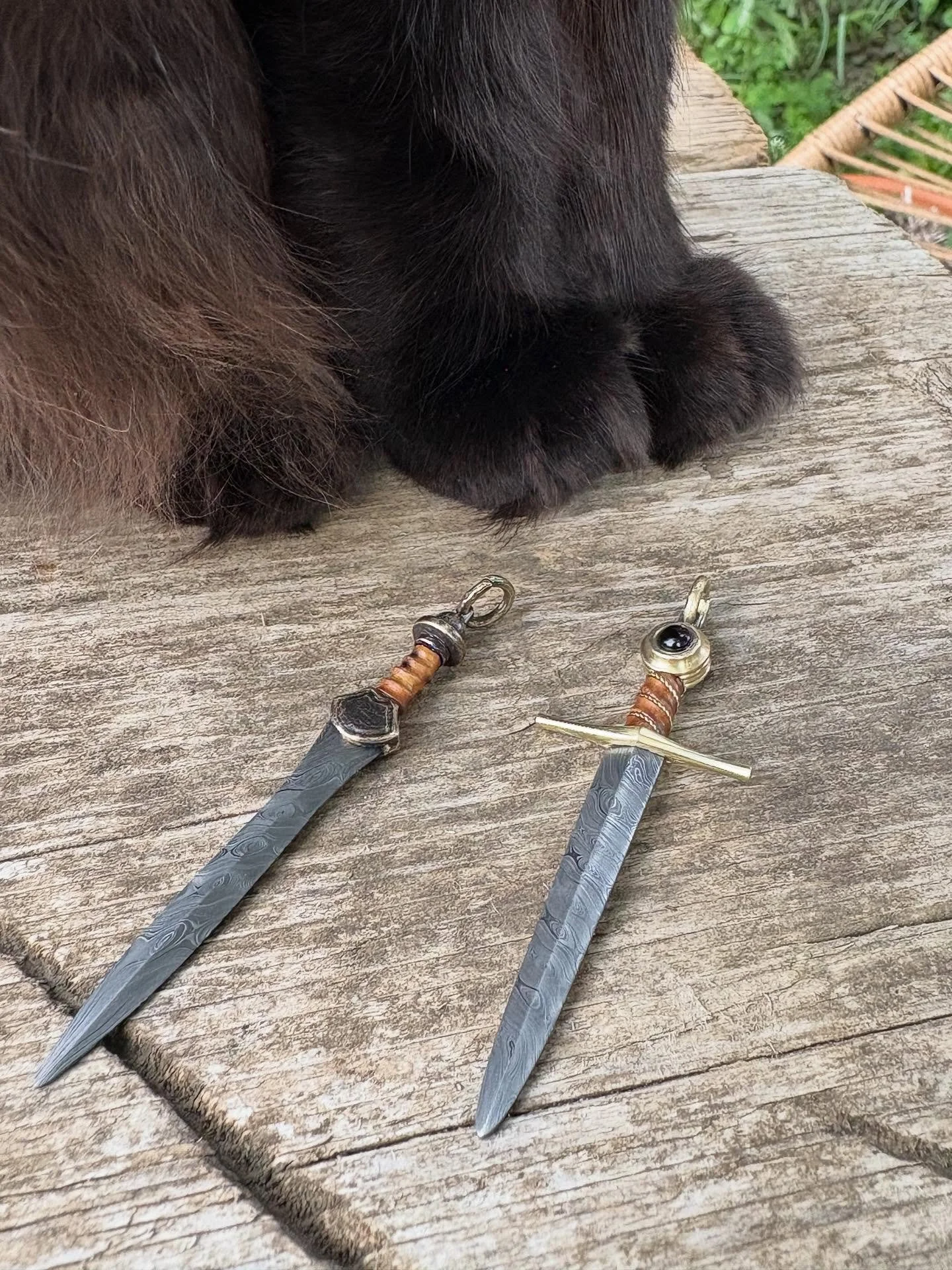 A couple of tiny sword pendants! (or they will be, once I attach them to some kind of chordage)

I tried twisting some damascus offcuts using my induction forge and I was surprised that it worked with no issues! I haven&rsquo;t tried using it to make
