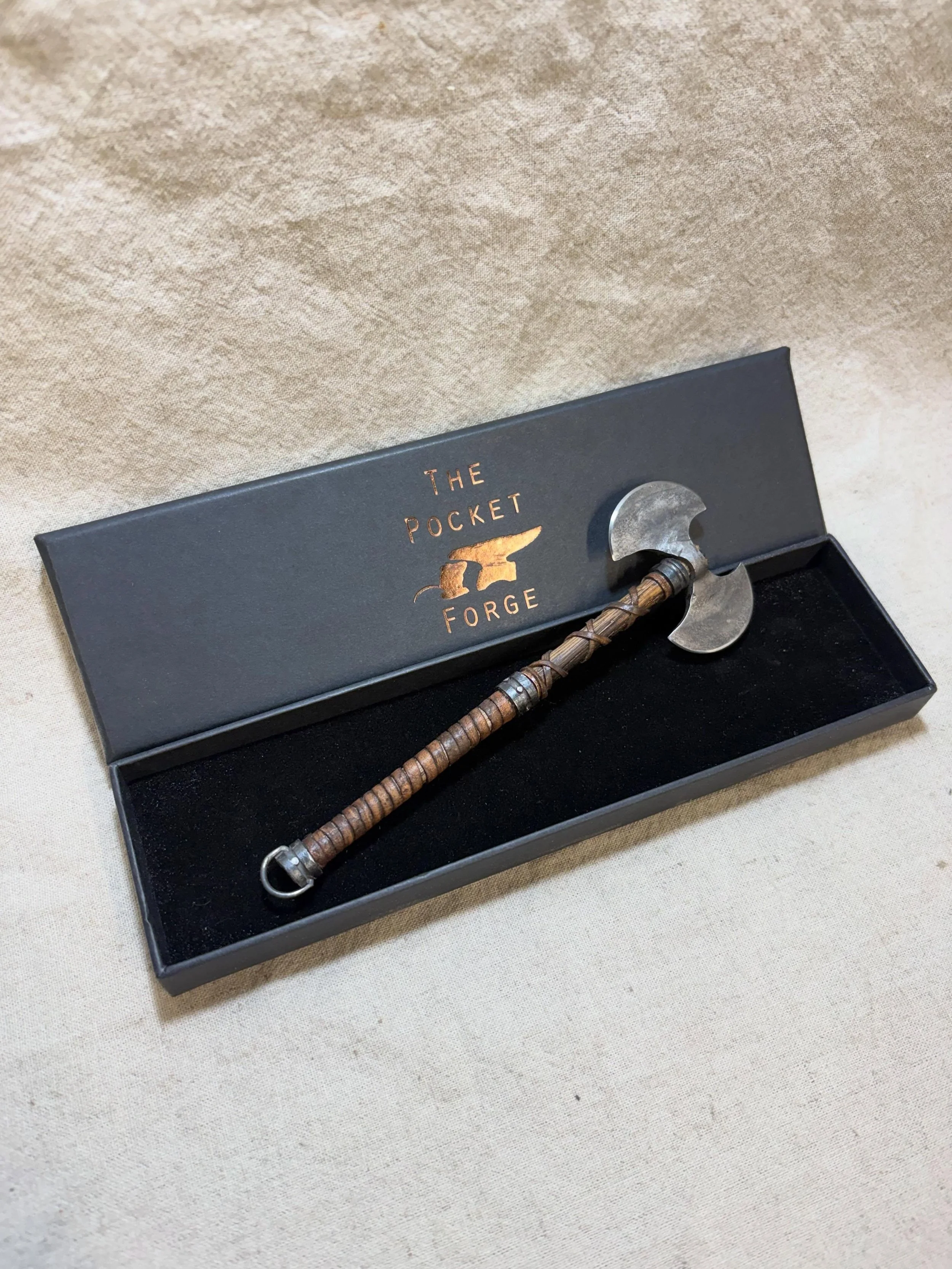 Got a couple of tiny labrys axes freshly made this week, perfect for pillaging and plundering a single gummi cola bottle from your local pick n mix 

One is 1/6 sized and sharp, the other is a pendant and blunt, both are just oak, leather and steel! 