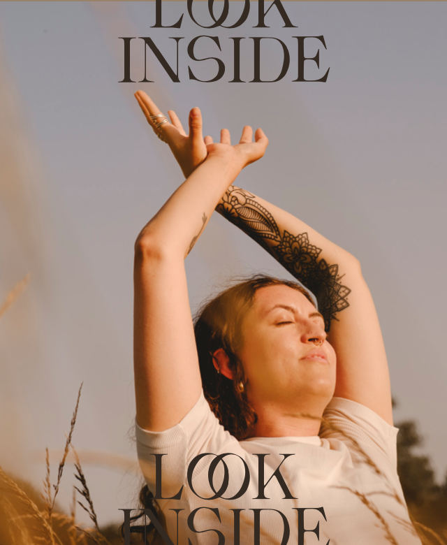 A woman with closed eyes and a tattooed arm stretching upward, with sunlight on her face, and the text 'LOOK INSIDE' at the top and bottom of the image.
