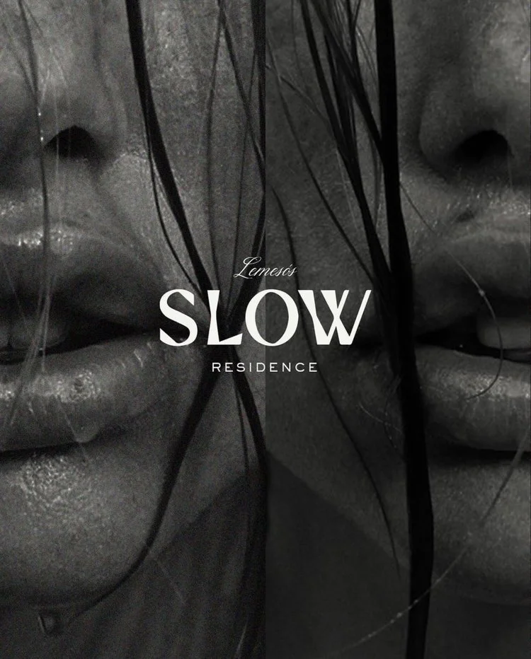 Close-up photo of a person's face, focusing on their nose and lips, with dark wet hair partially covering the face. Overlay text says 'Lemess SLOW Residence'.