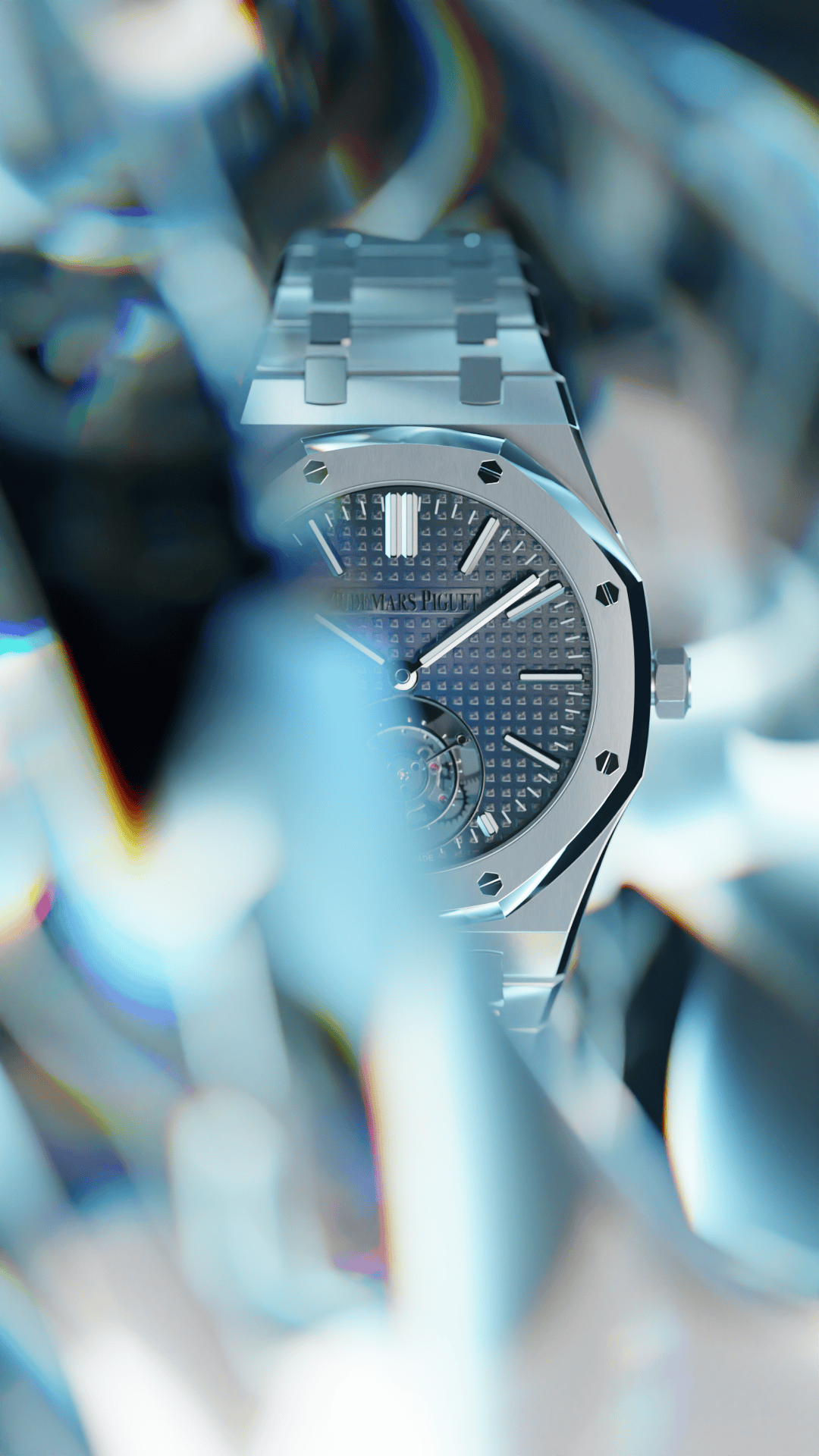 Une montre luxueuse en acier inoxydable avec un cadran gris foncé et une texture guillochée, entourée de reflets irisés.