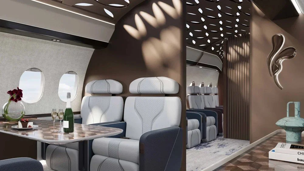 Side view of the luxury interior on the Falcon 7X aircraft designed by Oceanteriors – sophisticated comfort with ocean-inspired detailing