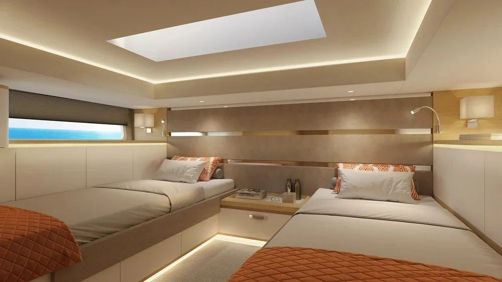 Side view of the luxury single bedroom interior on the 14m Level yacht designed by Oceanteriors – refined detailing in a compact layout