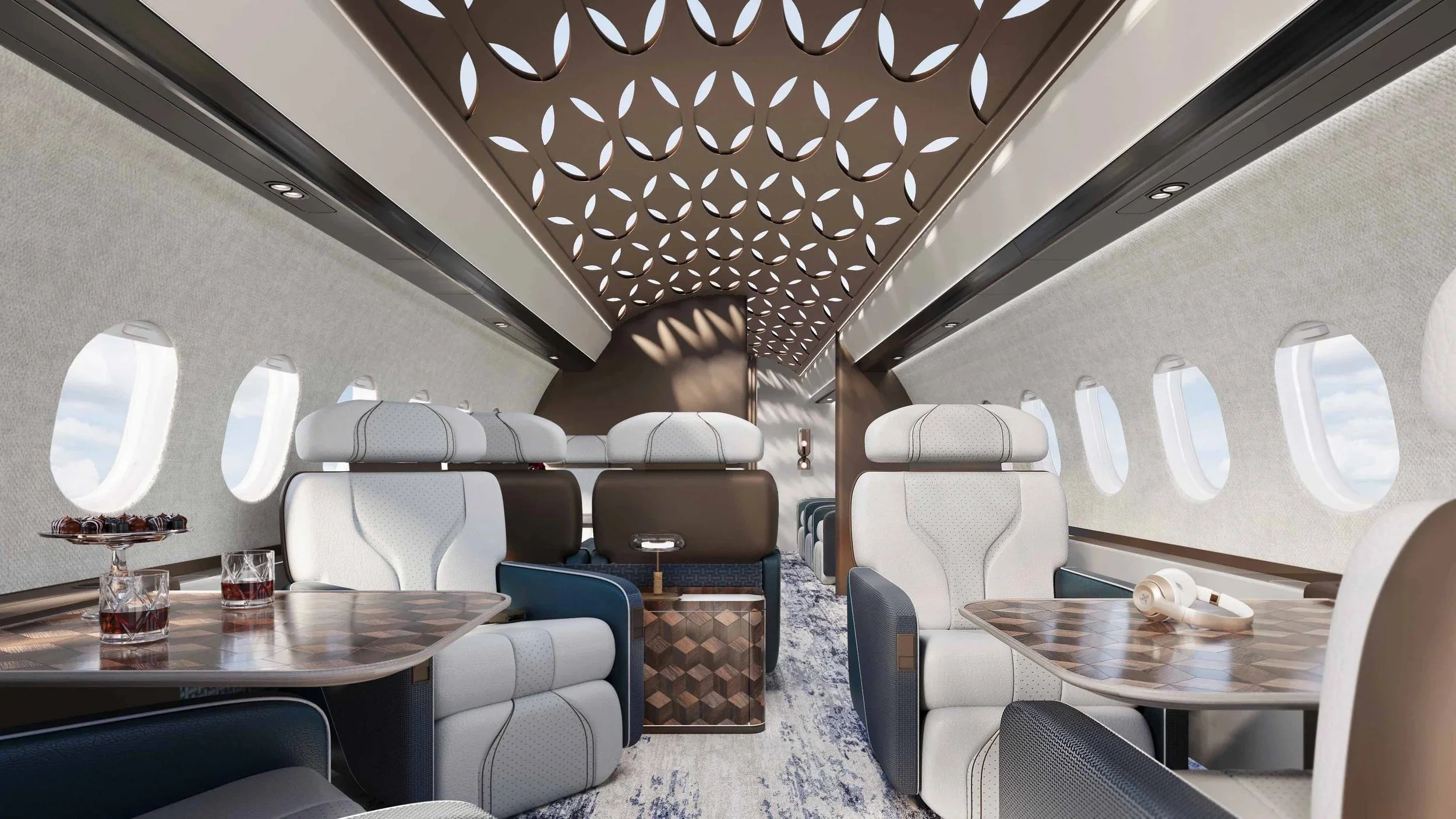 View of the luxury interior on the Falcon 7X aircraft designed by Oceanteriors – sophisticated comfort with ocean-inspired detailing