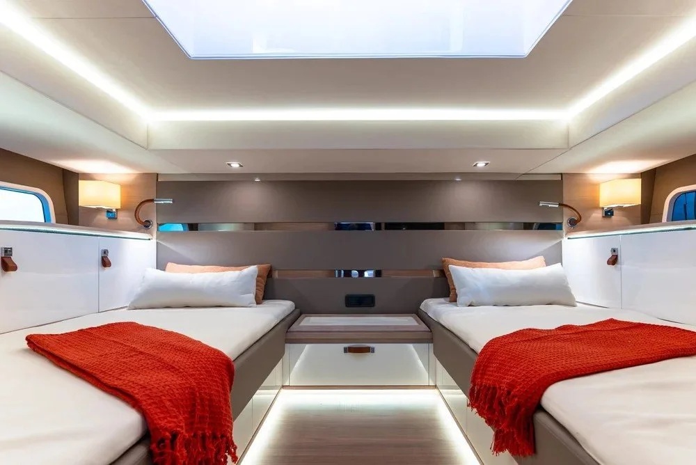 Elegant single bedroom / cabin interior on the 14m Level yacht by Oceanteriors – smart space optimization with ocean-inspired elegance