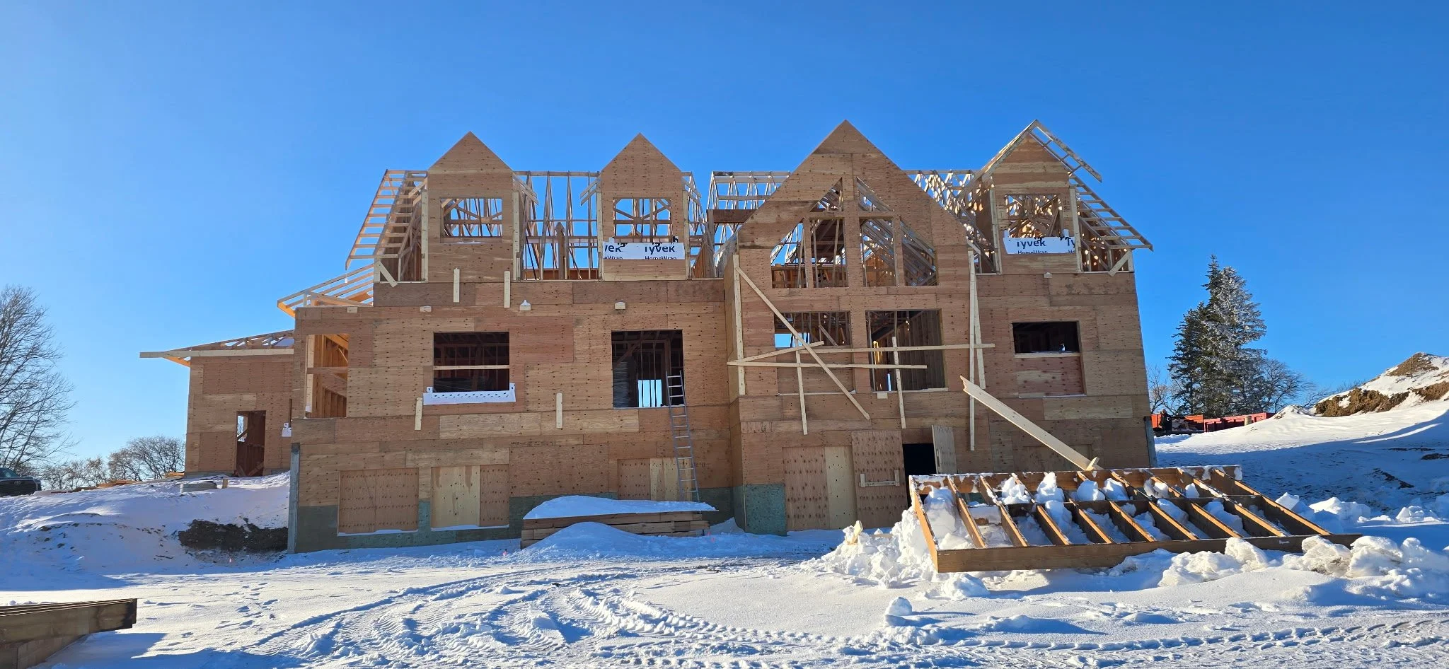 Display of sample cabinet door materials and paint color options, including wood, marble-patterned, and solid color samples.