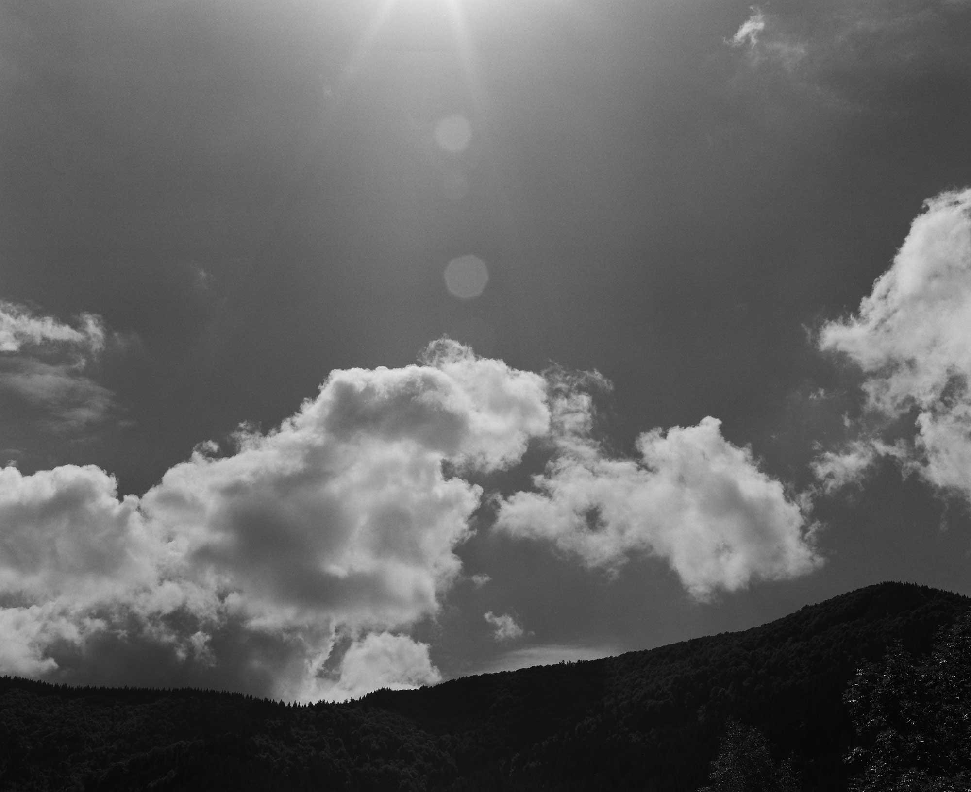Big clouds horizon & lens flare