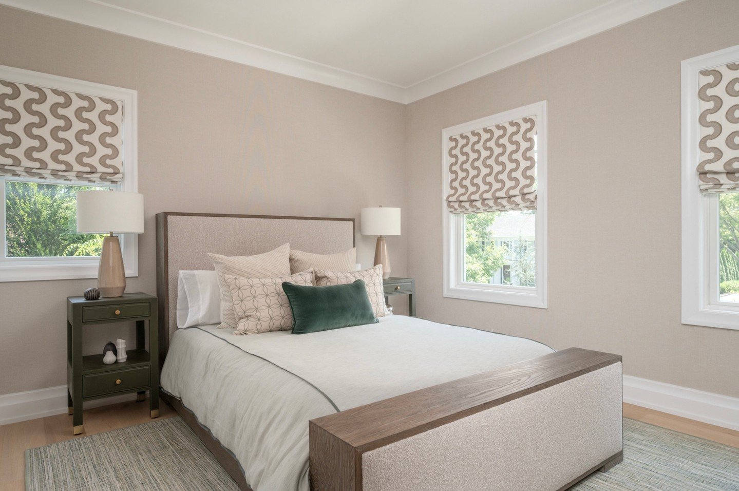 Moving to the second floor of this home, each guest bedroom tells its own story.
Soft textures, tailored bedding, and layered color palettes bring warmth and individuality to every space &mdash; from serene blues to rich taupes and deep greens.
Cozy,