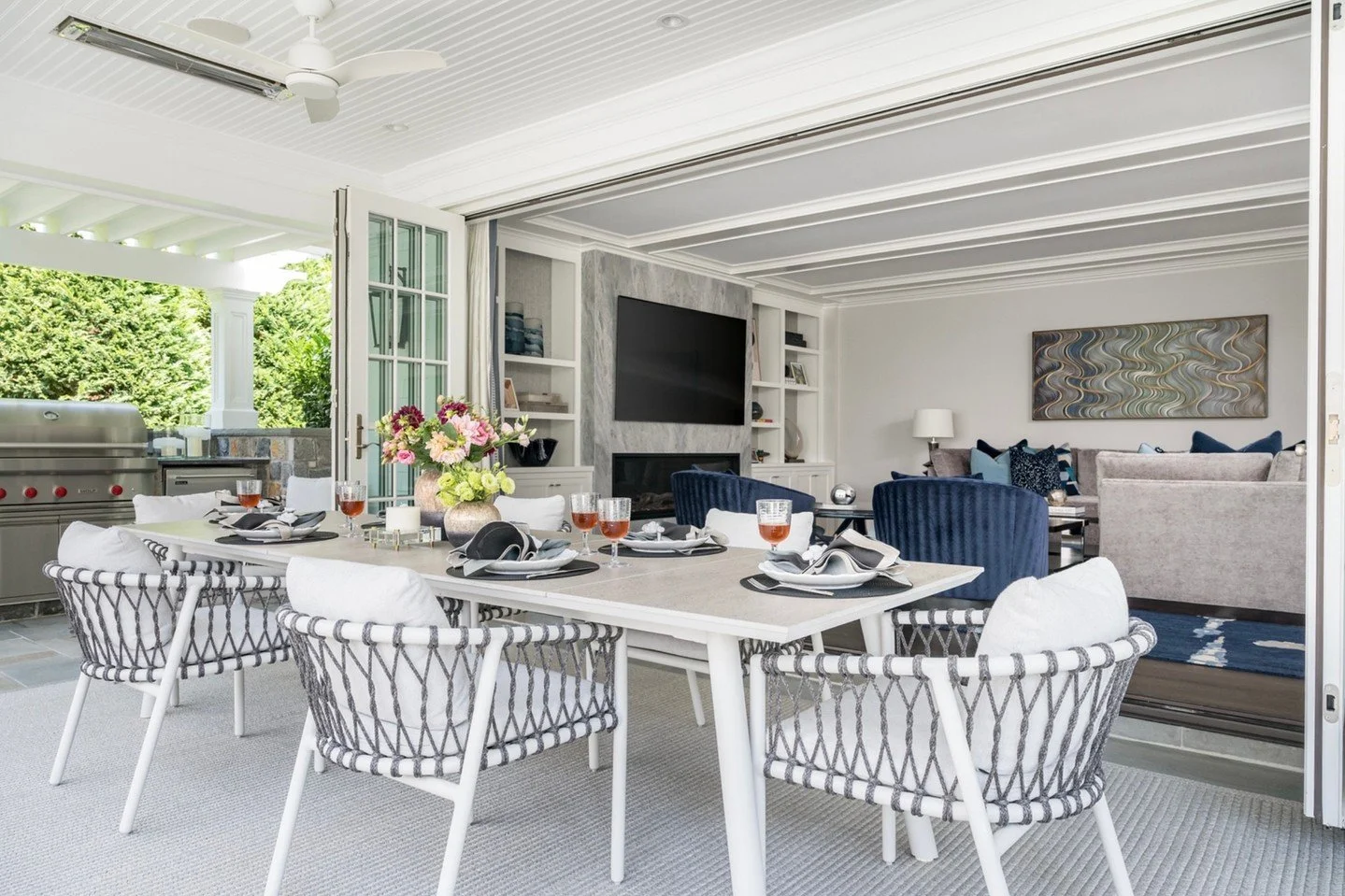 Where indoors and out become one ✨
Expansive sliding doors fully open the family room to the covered terrace, creating a seamless transition from cozy interiors to effortless outdoor dining. The connection feels natural and intentional &mdash; perfec