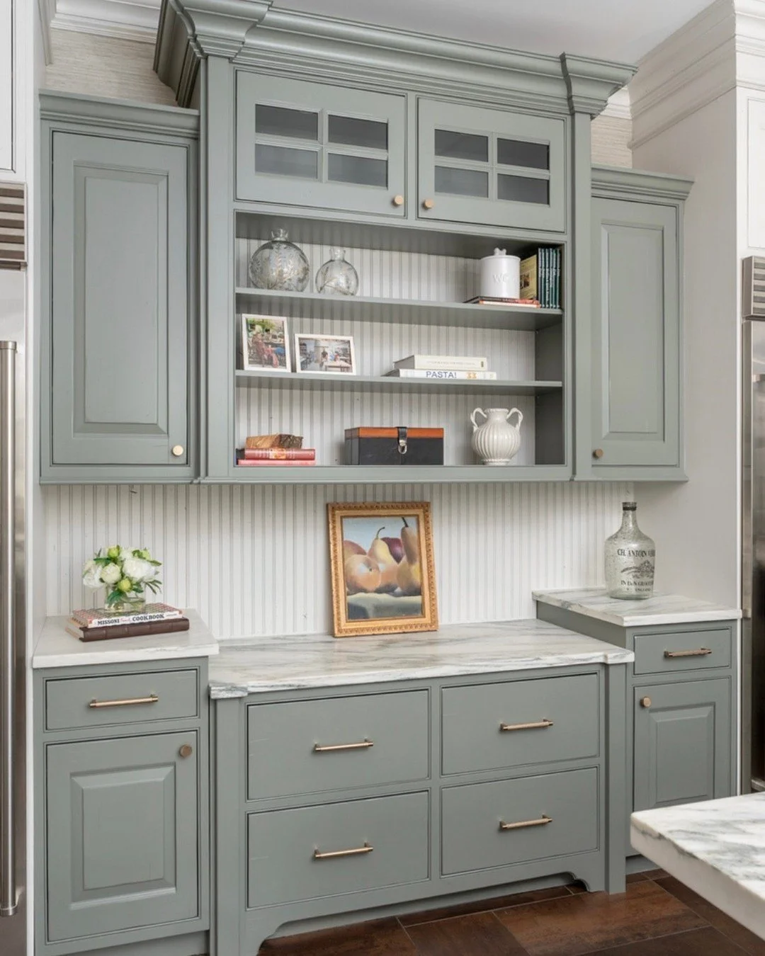 Carrying the palette beyond the kitchen 🤍
We brought the soft sage green cabinetry into the dining area to create a seamless flow between spaces&mdash;tying everything together in a way that feels intentional and cohesive. Custom built-ins offer bot