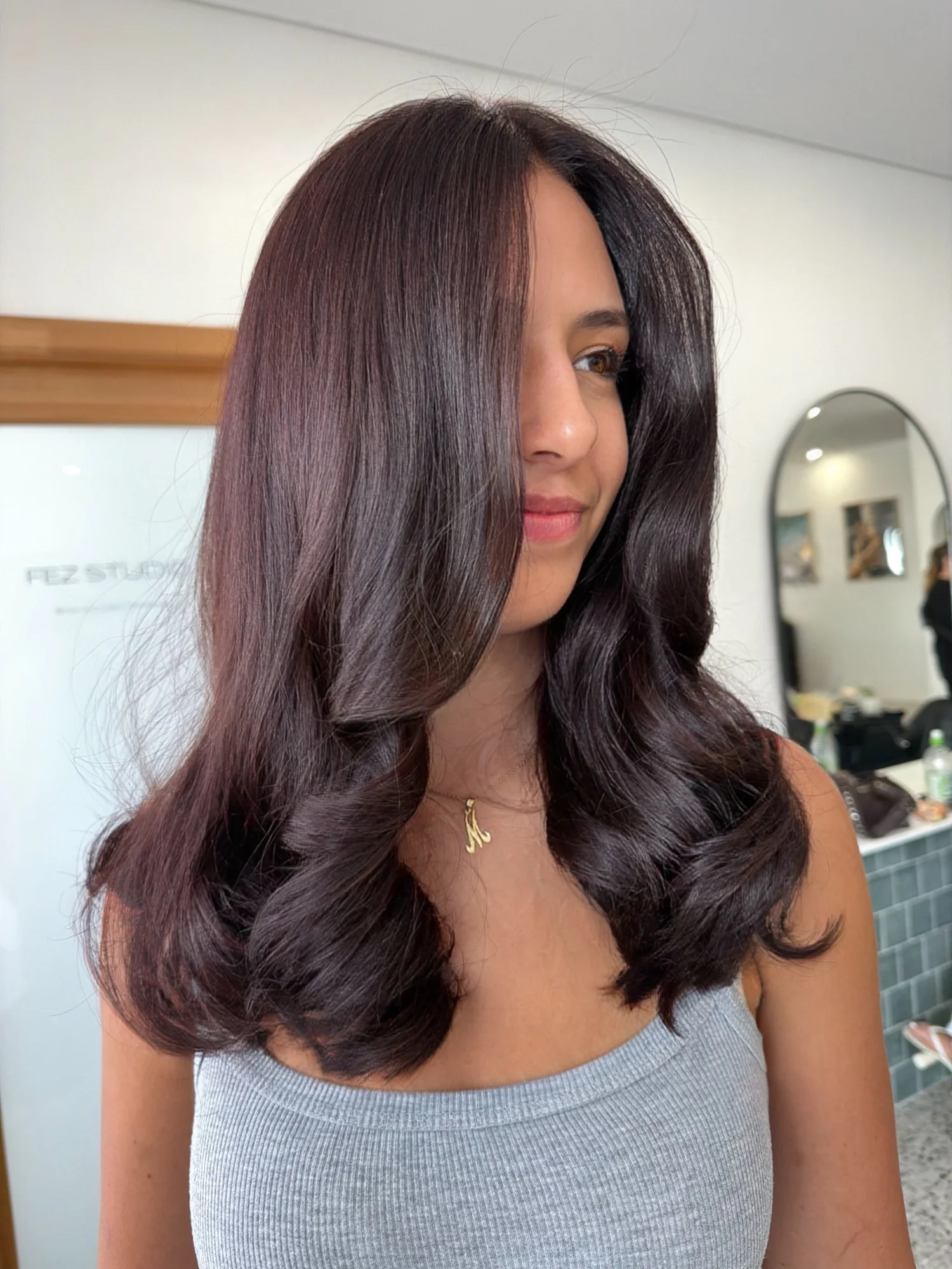 Deep plum brunette hair by Studio REMMI