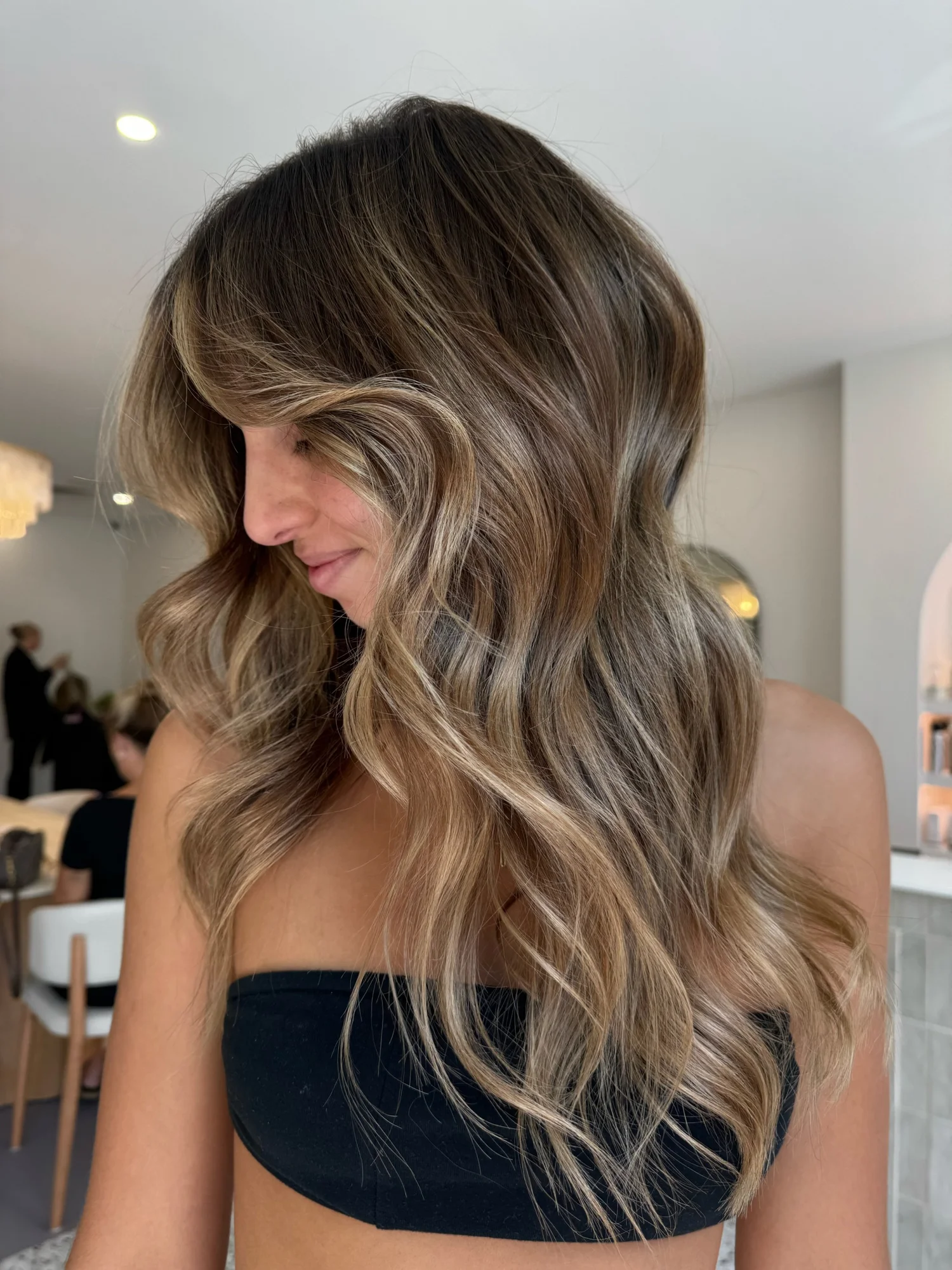 Soft dimensional brunette hair by Studio REMMI