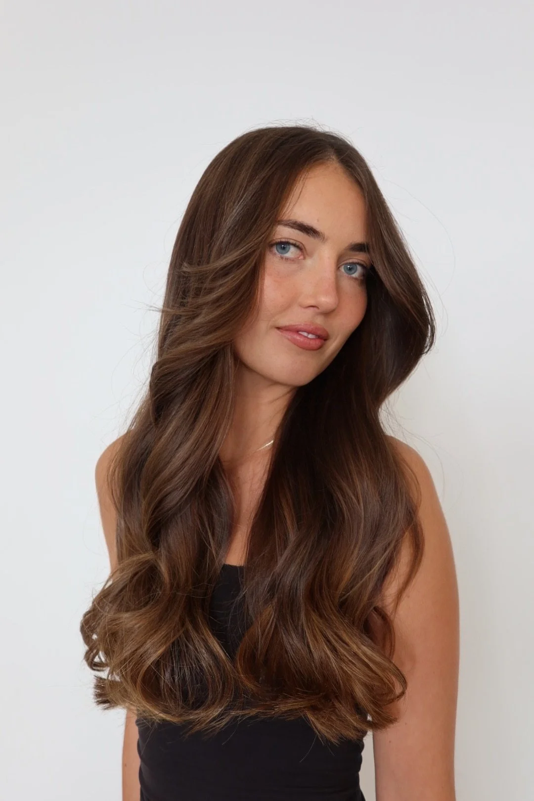 Rich brunette hair by Studio REMMI