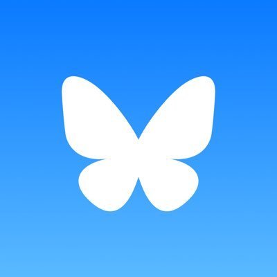 White butterfly silhouette on blue background