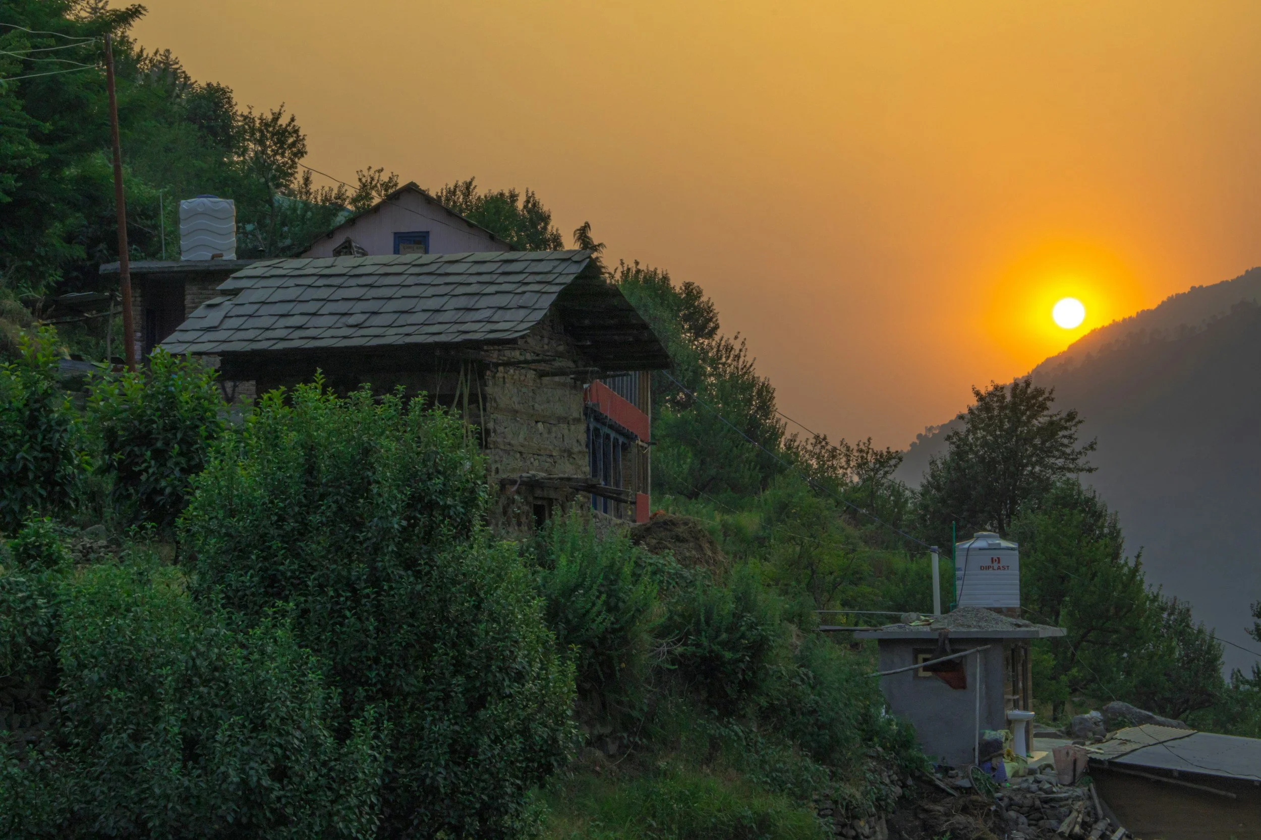 sunset and village