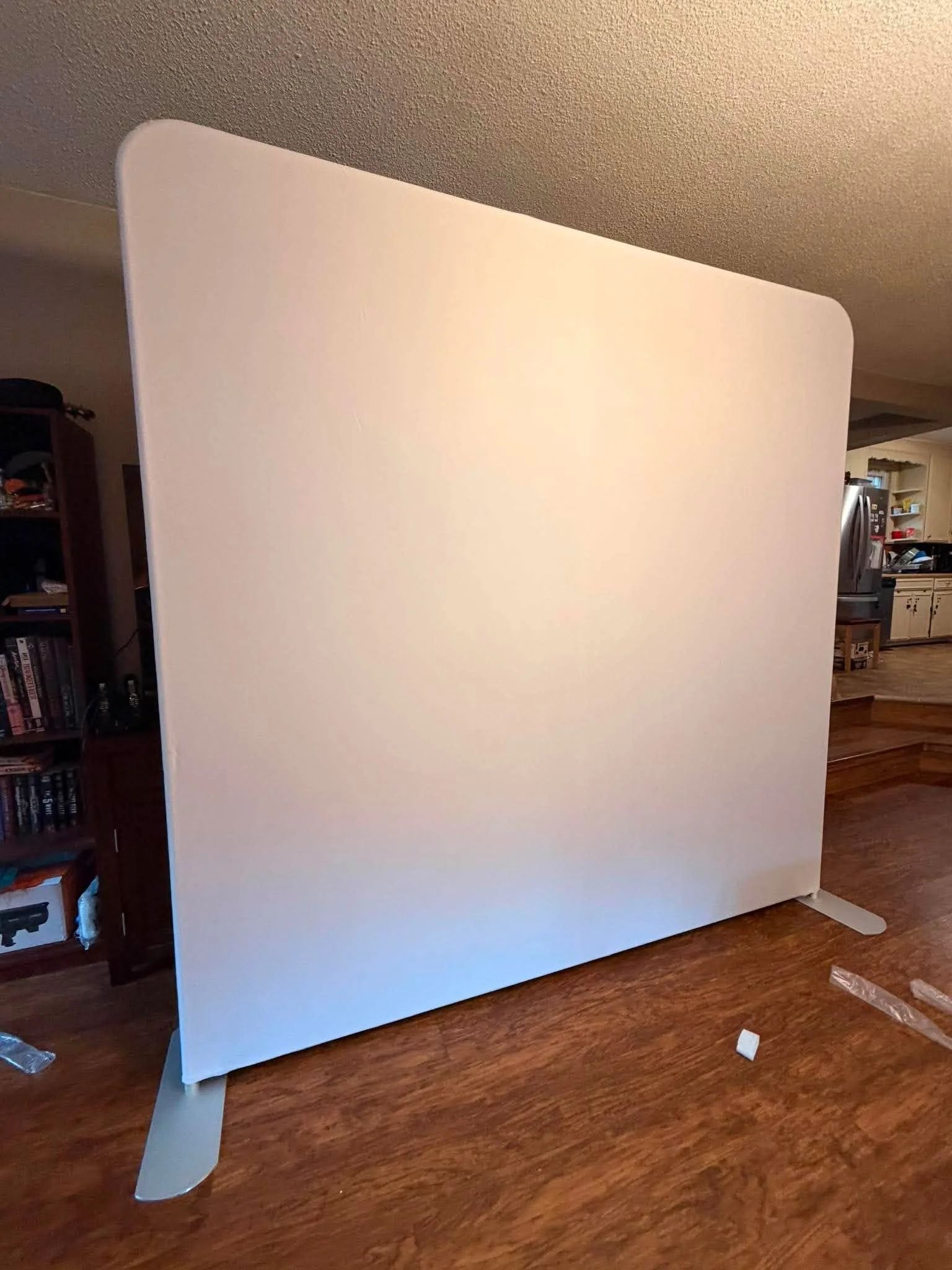 This is a pillowcase backdrop (also called a tension fabric backdrop).