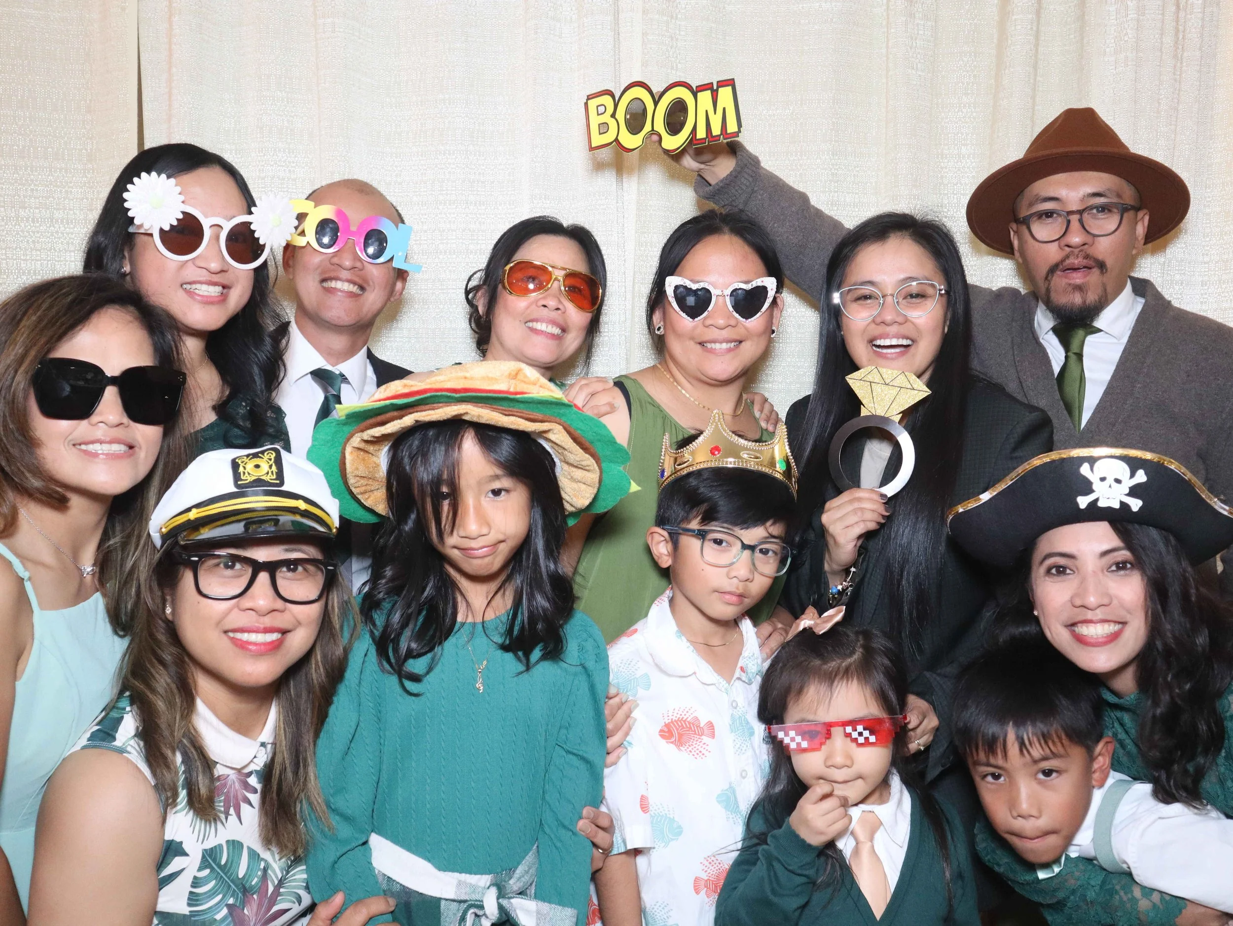 People of all ages enjoy the photobooth.