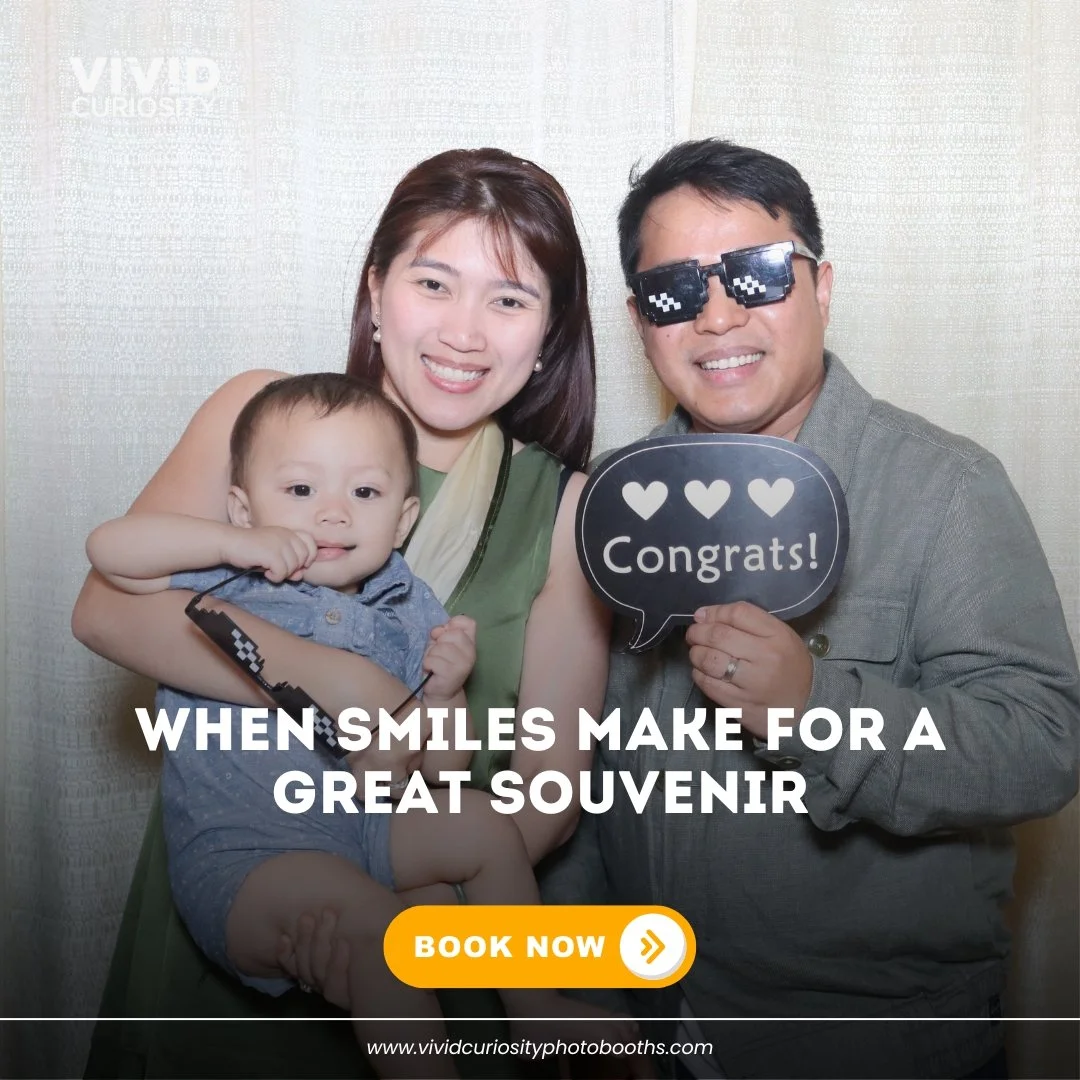 The baby wore the glasses better, and we have proof. 👶🕶️📸
This is what a photobooth moment actually looks like. No over-posing, no stiff smiles. Just a little family, a "Congrats!" sign, and a set of pixel shades that somehow ended up on