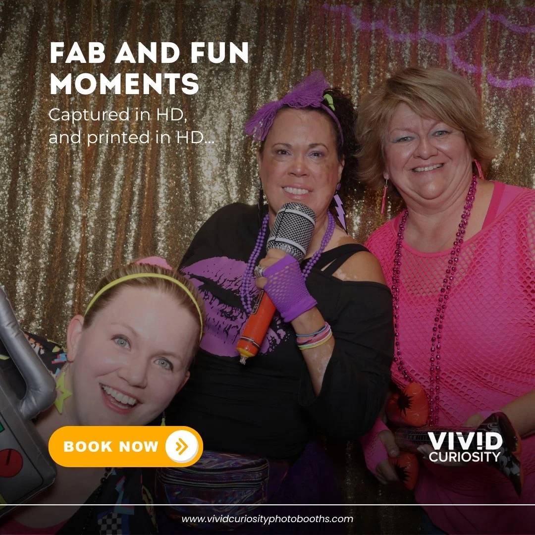 They did not come to take a quiet photo. And we respect it completely. 🎤💜📸	

Full 80s energy. Inflatable mic. Fingerless gloves. The gold sequin backdrop holding strong behind all of it. This is a real event moment at its best, unscripted, fully c
