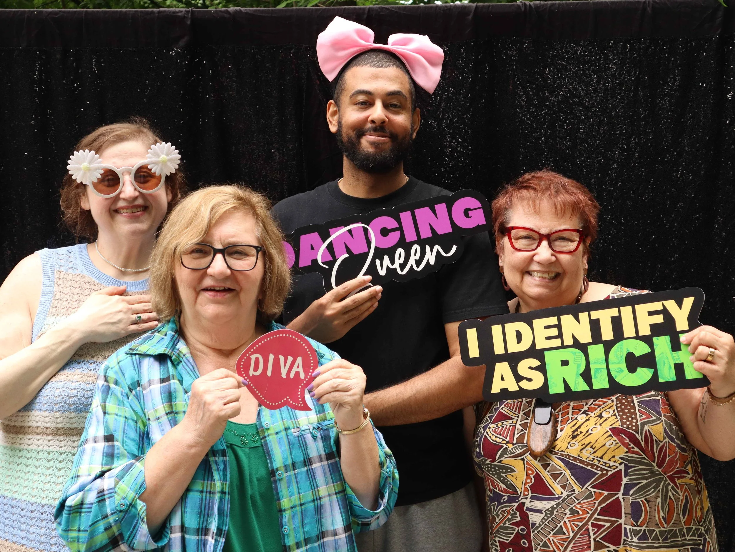 Whether formal or casual events, guests play around and smile at the photobooth.