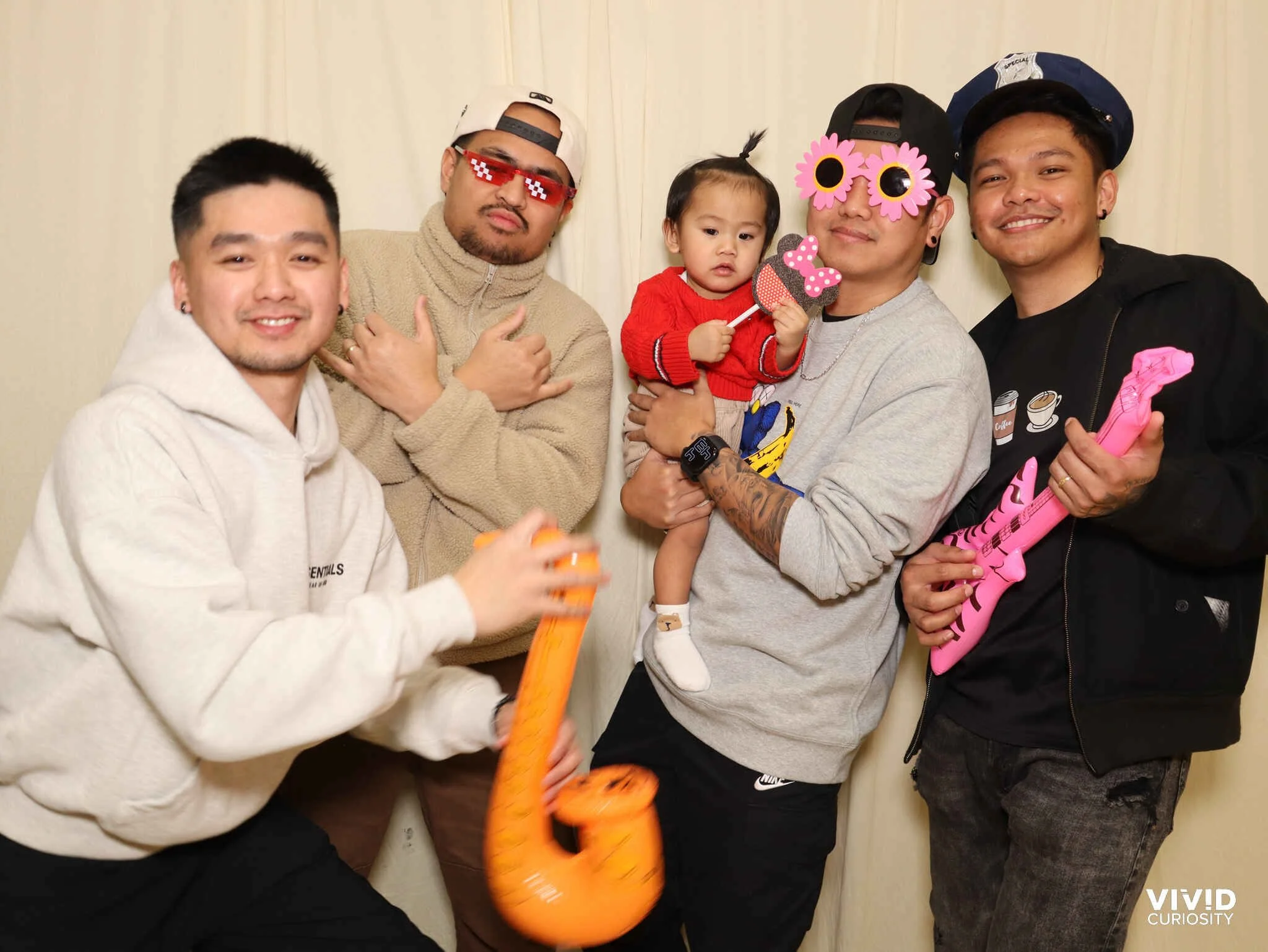 You know what’s fun? Men being boys in a photobooth. (Trust us, it’s chaotic in a good way)