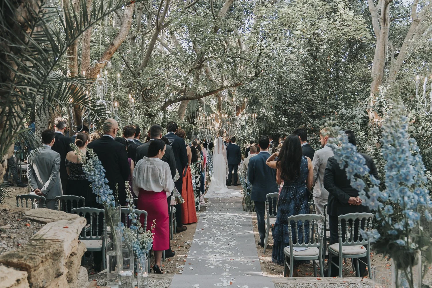 Ceremony beneath the centuries old tree at Castello Xirumi, Sicily