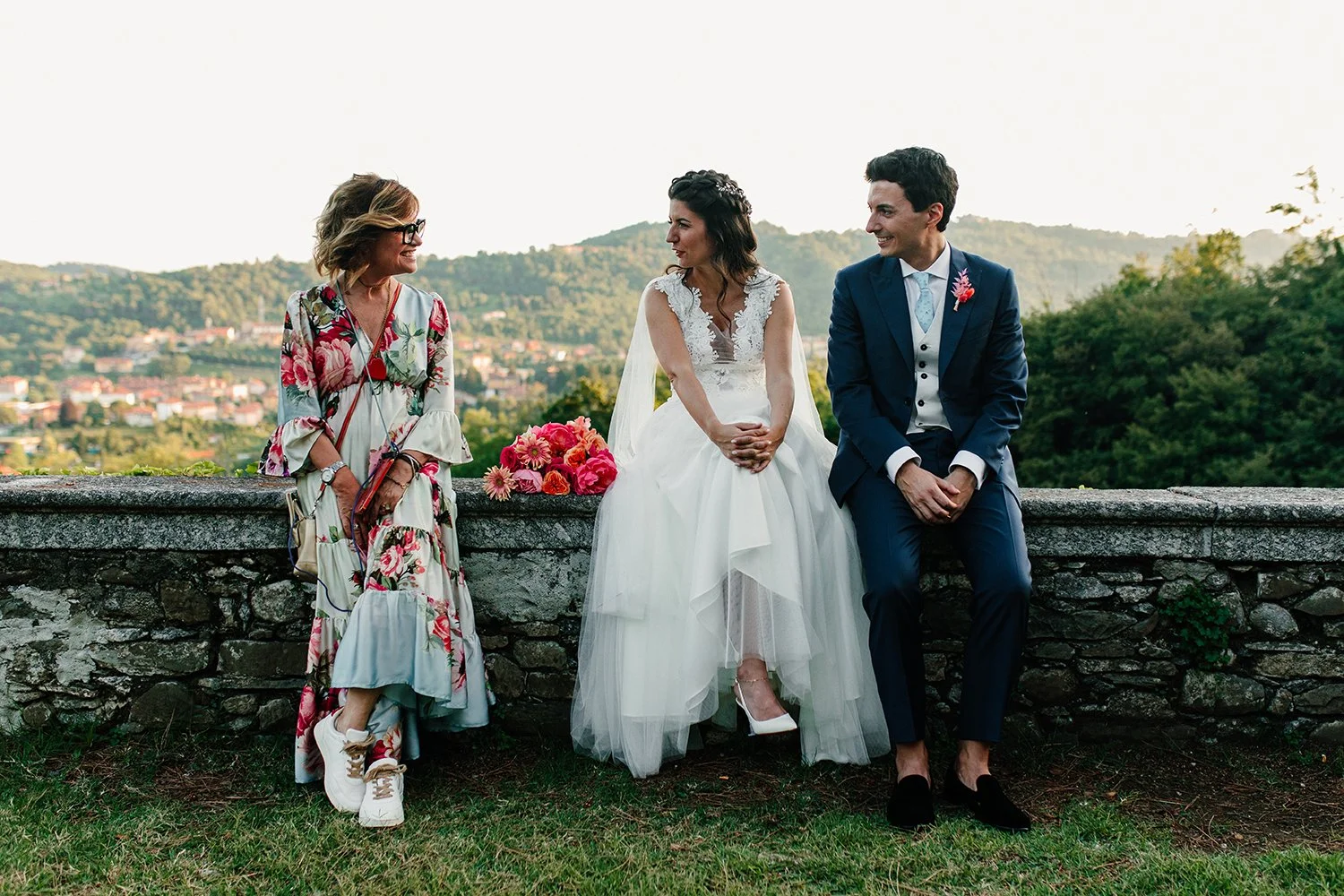 Wedding planner coordinating setup details during a wedding in Italy