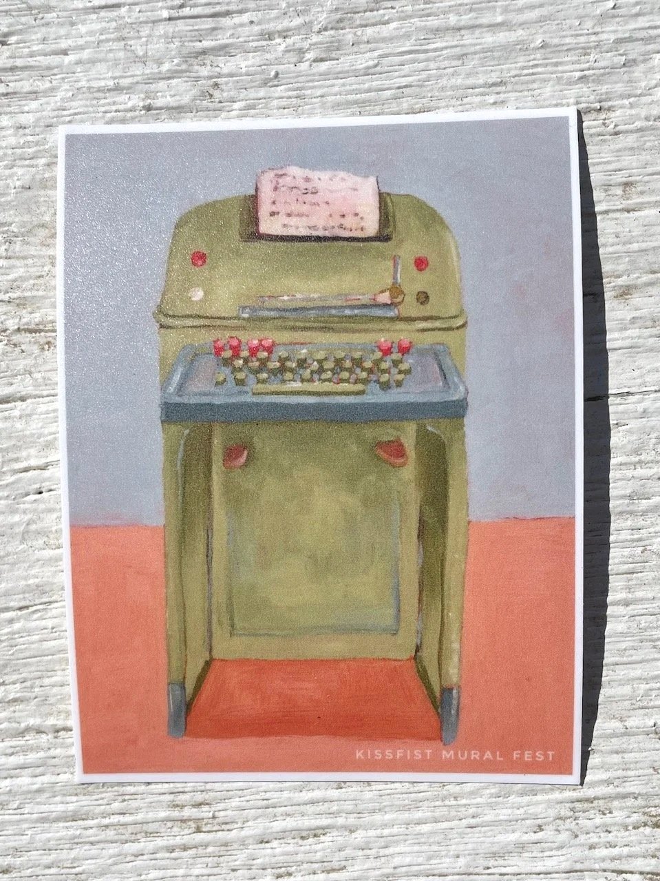 the green monster sticker is displayed on a weathered white wooden banister.