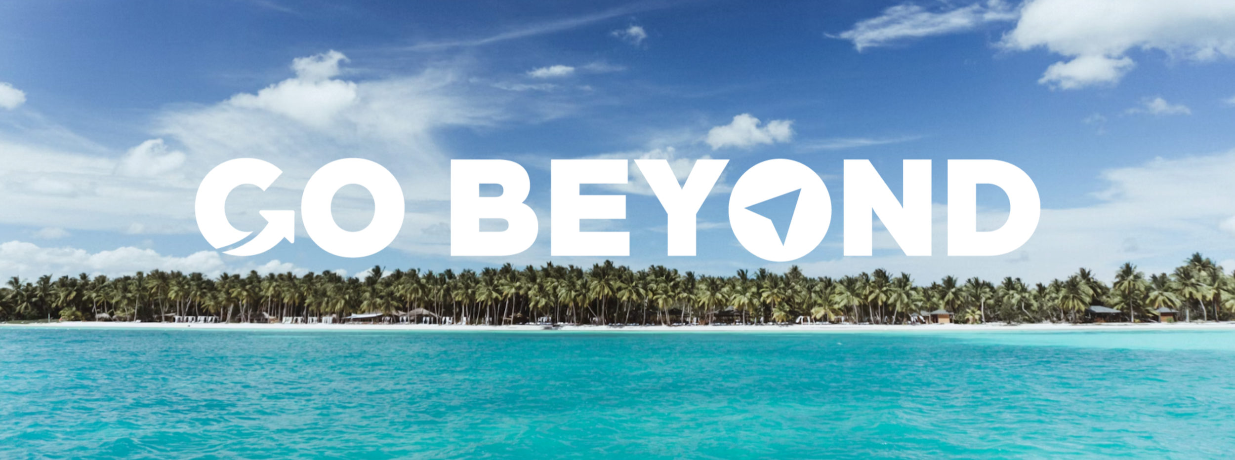 A tropical beach scene with turquoise water, a long stretch of sand, and a line of palm trees under a bright blue, slightly cloudy sky. The text "GO BEYOND" is written in large white letters across the image.