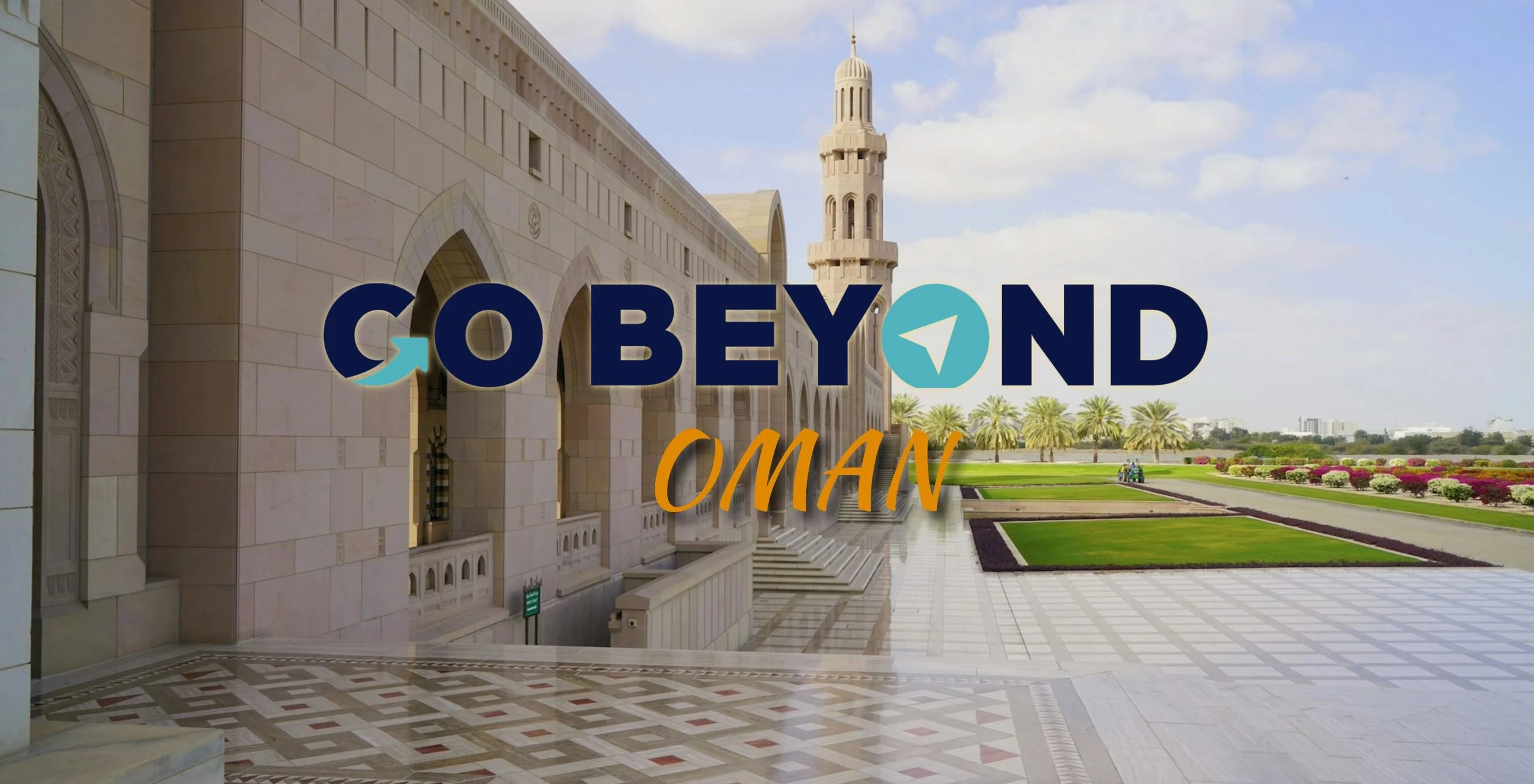 A wide view of the grand architecture and manicured gardens of the Sultan Qaboos Grand Mosque in Oman, with the bold text "GO BEYOND OMAN" overlaid across the center.