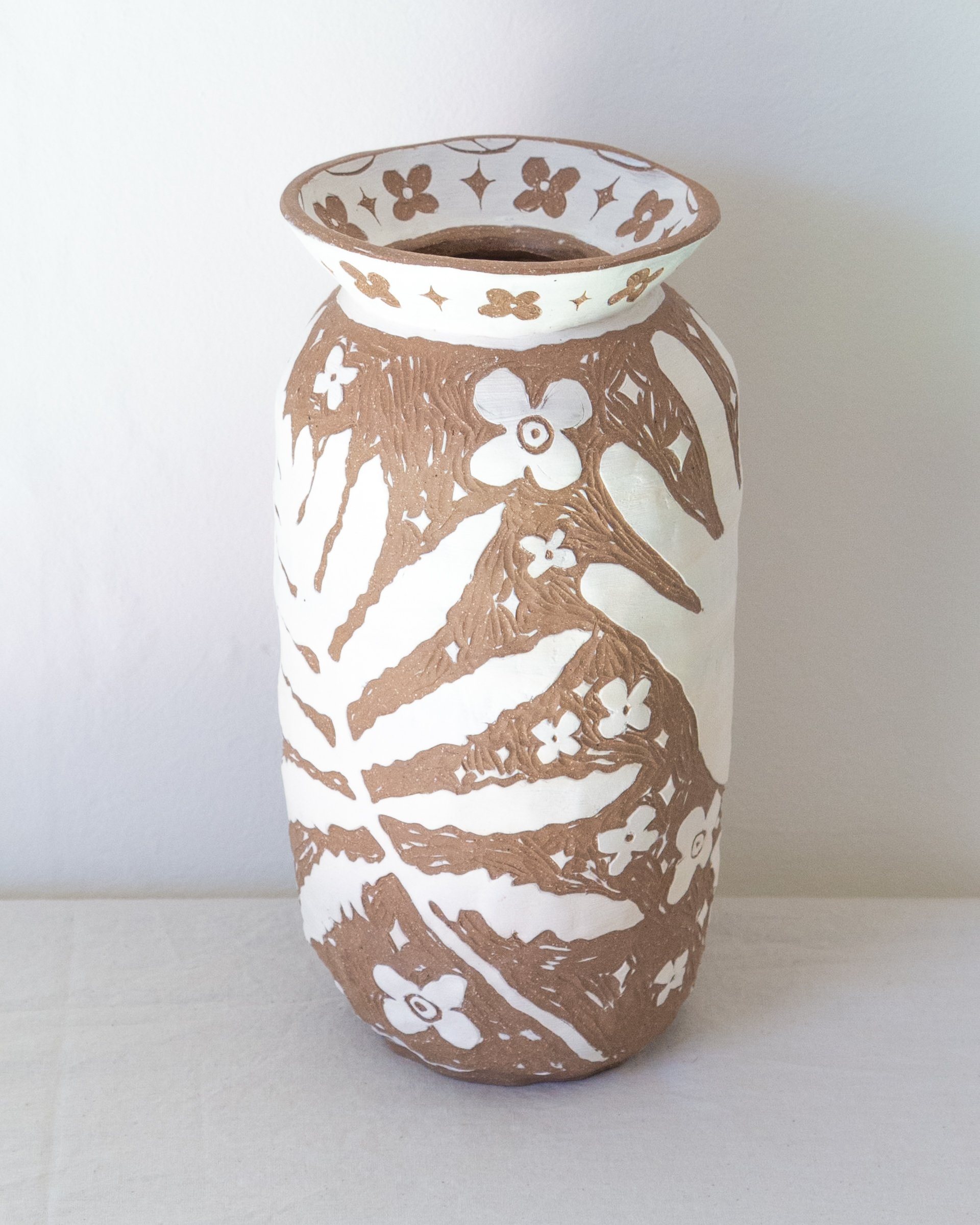 Vessel (Sensitive ferns, my hands, and ancient flowers)