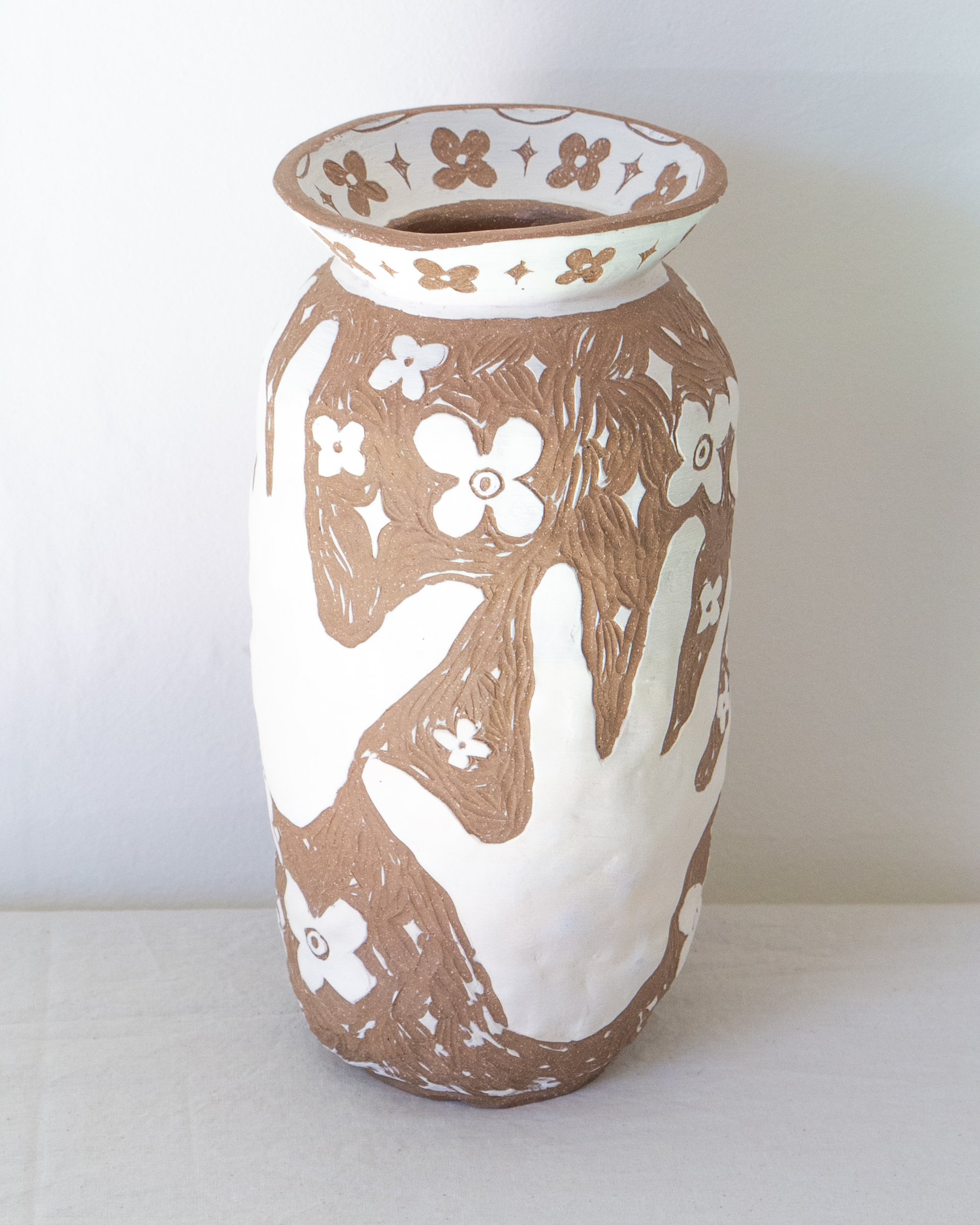 Vessel (Sensitive ferns, my hands, and ancient flowers)