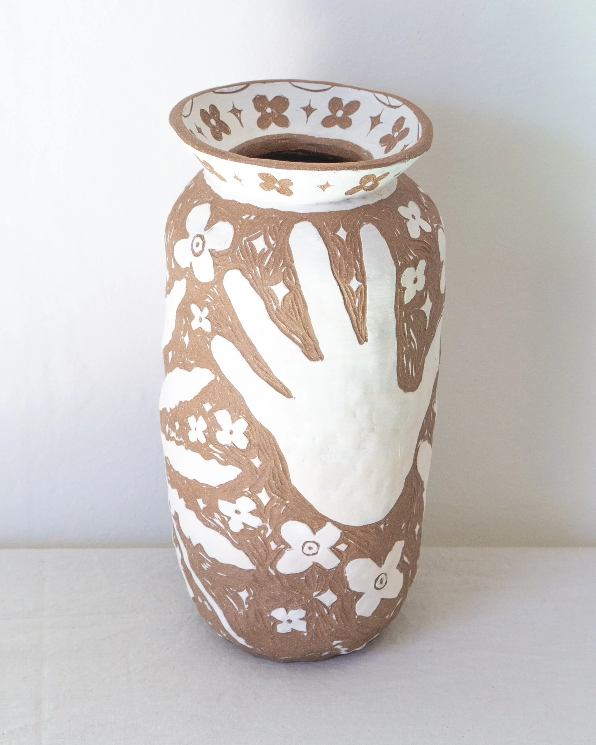 Vessel (Sensitive ferns, my hands, and ancient flowers)