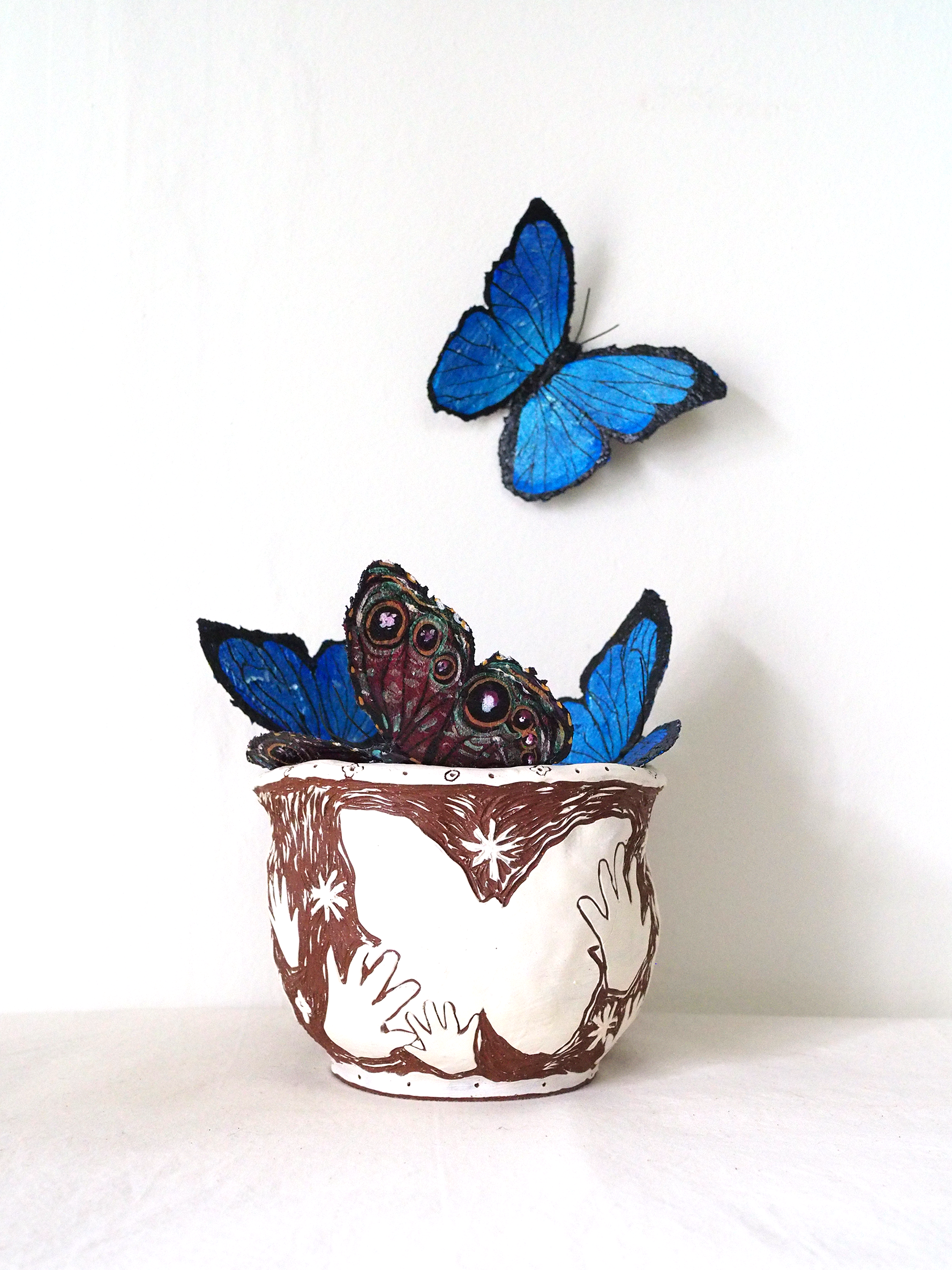Ways to hold a butterfly