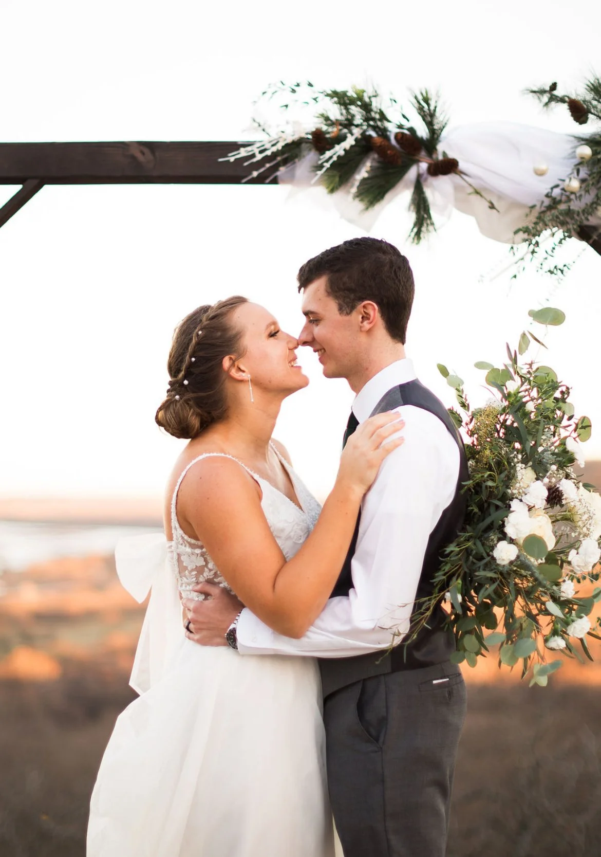 bride and groom at the ceremony site at dreampoint ranch in Bixby Oklahoma 