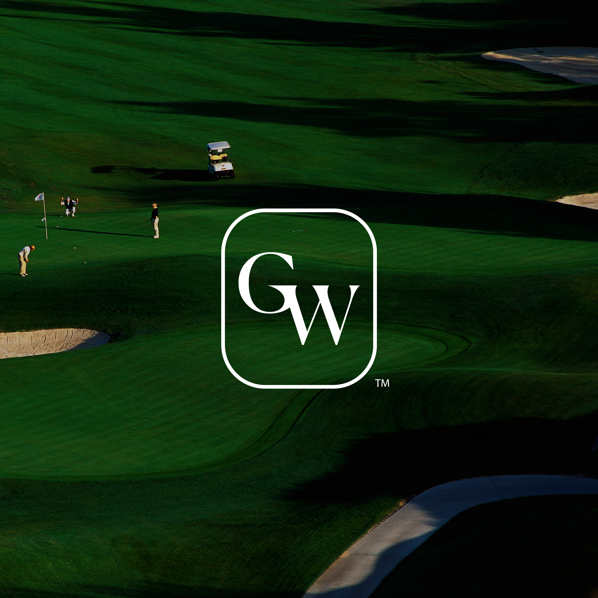 Golf course with players, sand trap, and golf cart, logo with initials GW in the center