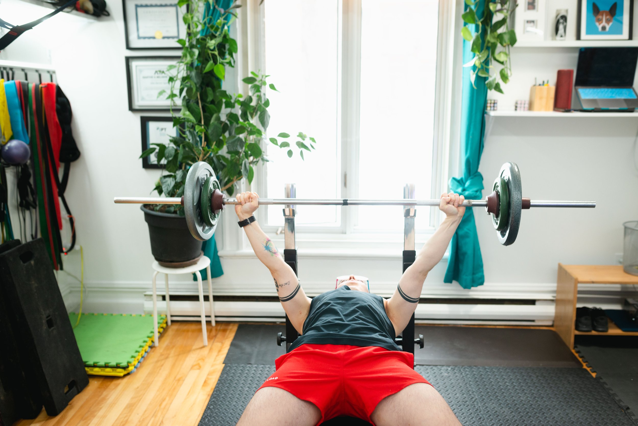 Person Holding weight, lying down.