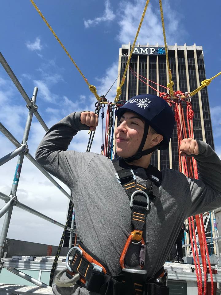 dibs in harness after ziplining from AMP building in Sydney Australia