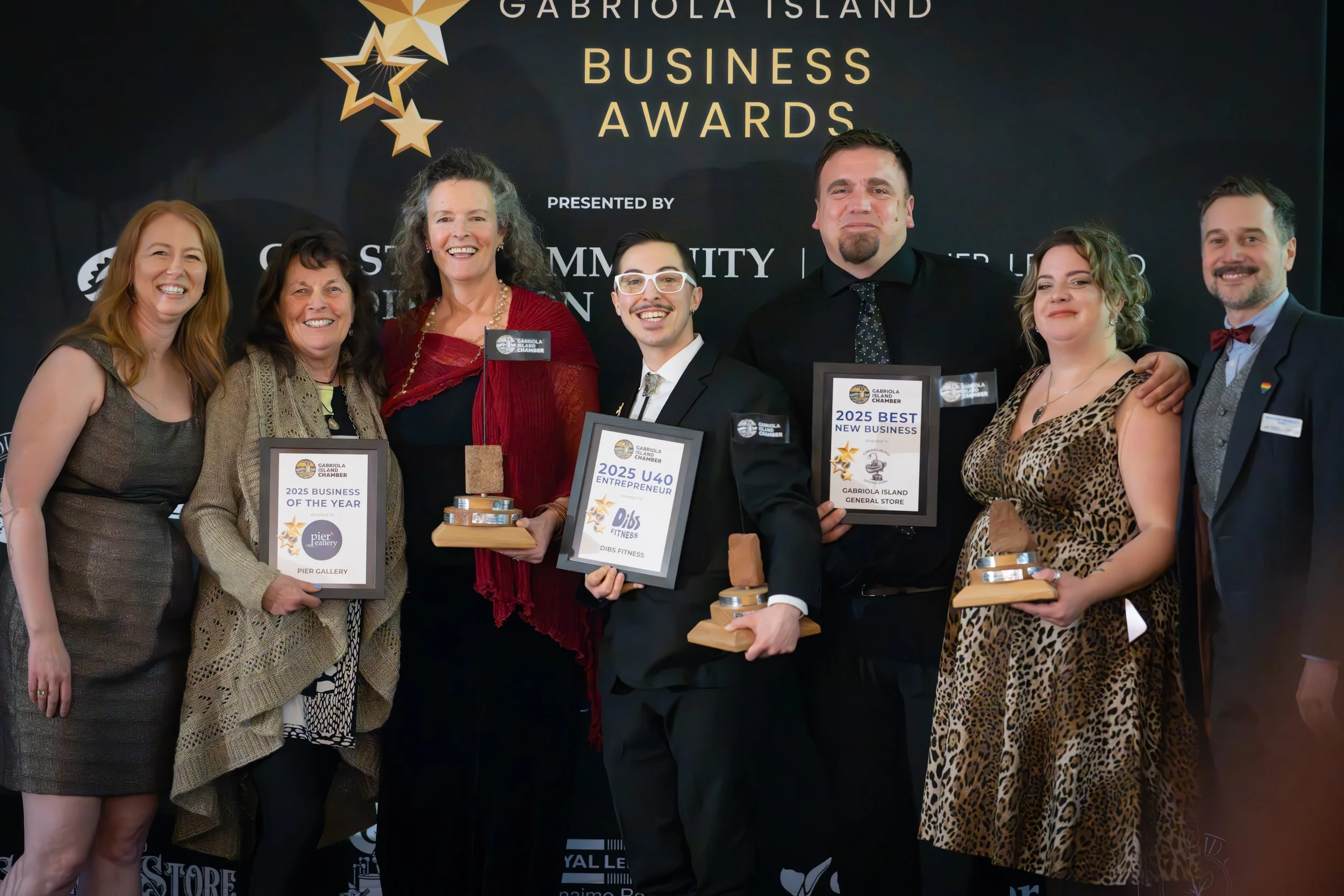 Gabriola Island business Award winners pose with their trophies and members of the business chamber