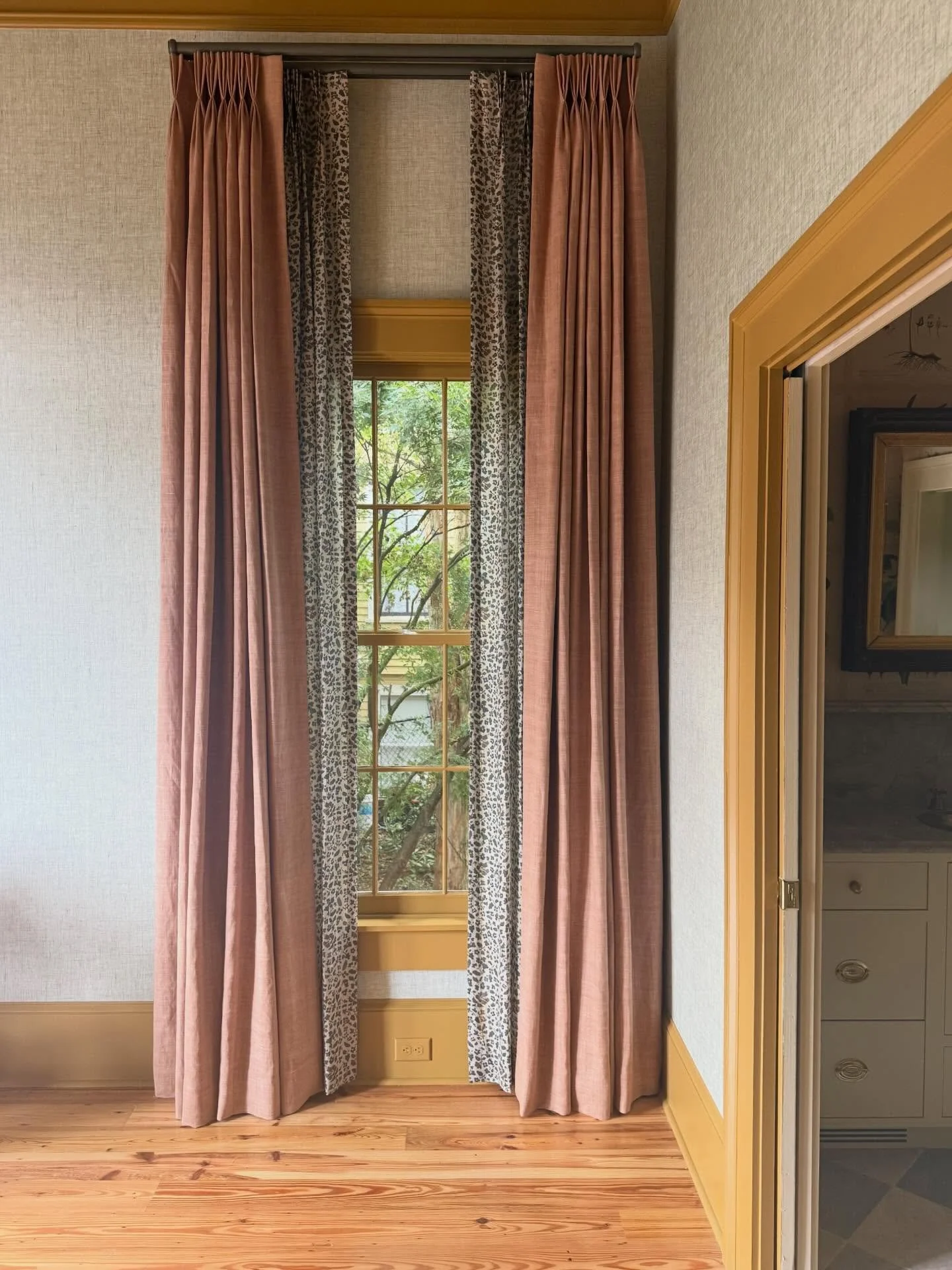 A subtle way to add patterned draperies, have fun with a floral sheer layered beneath a special solid linen. This is our Darby in Saxe printed on our newest lightest weight option. Coming to the site soon!