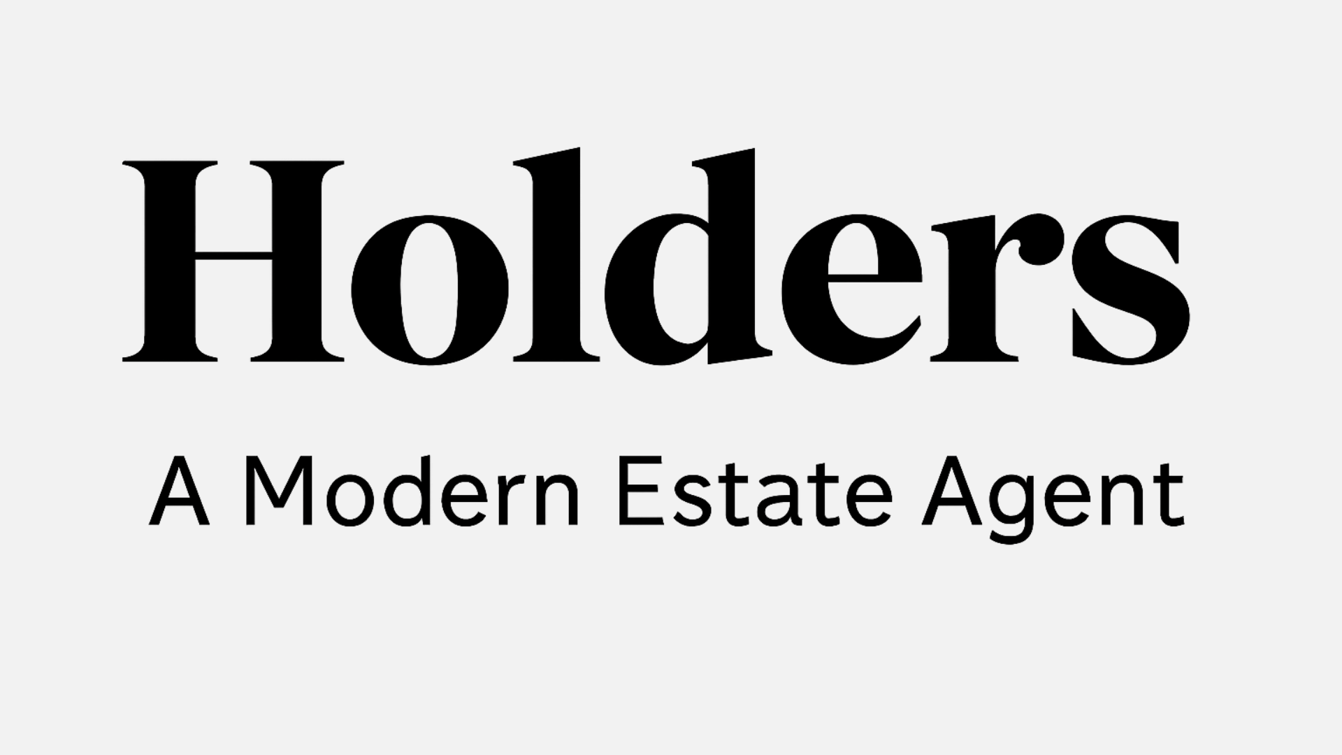 Text display that reads 'Holders: A Modern Estate Agent' on a gray background