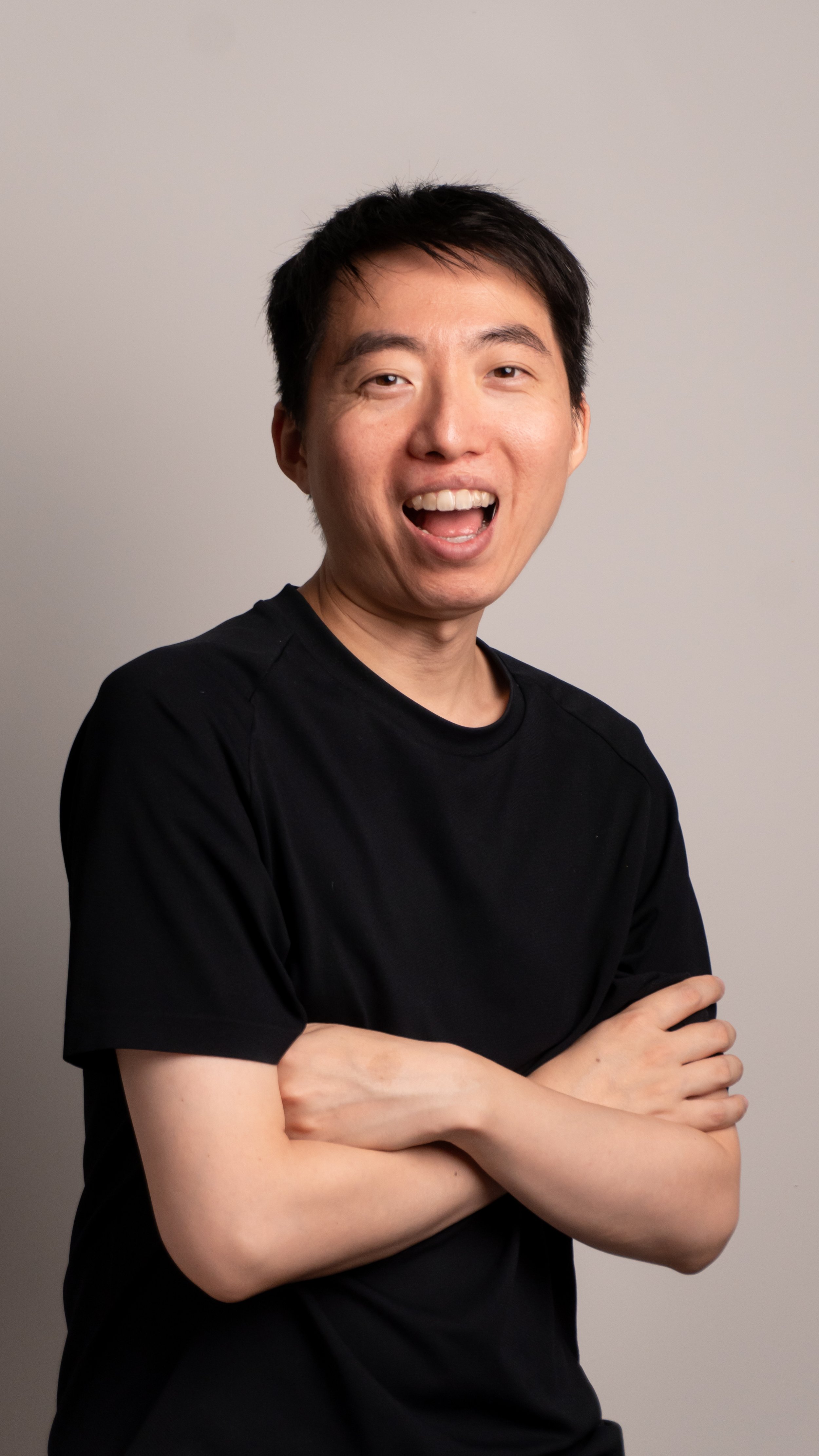 Tomoya Aomori smiling, ready to hear from you about your project