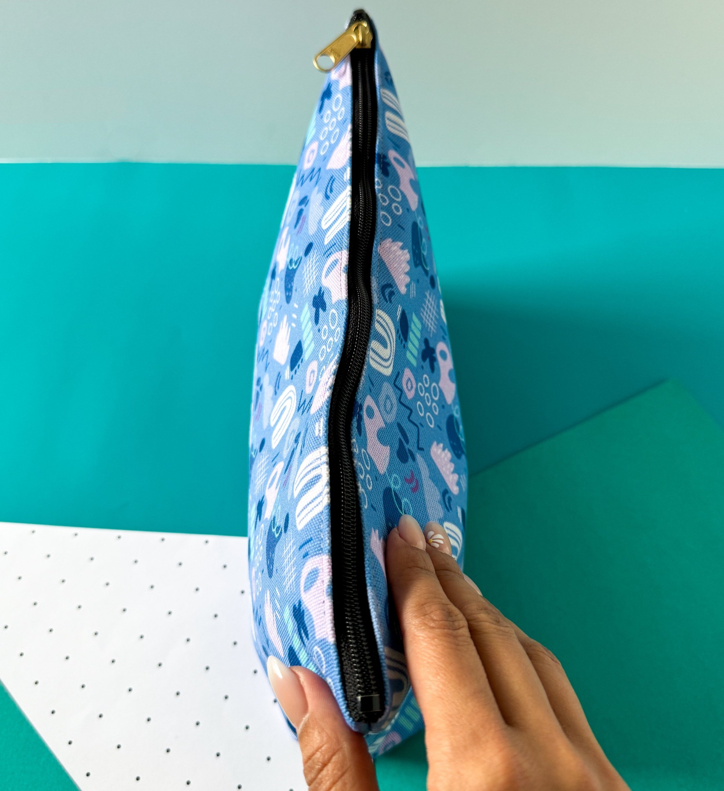 abstract shapes and lines pattern in a fabric pouch perfect for gifting, traveling and as a pencil case