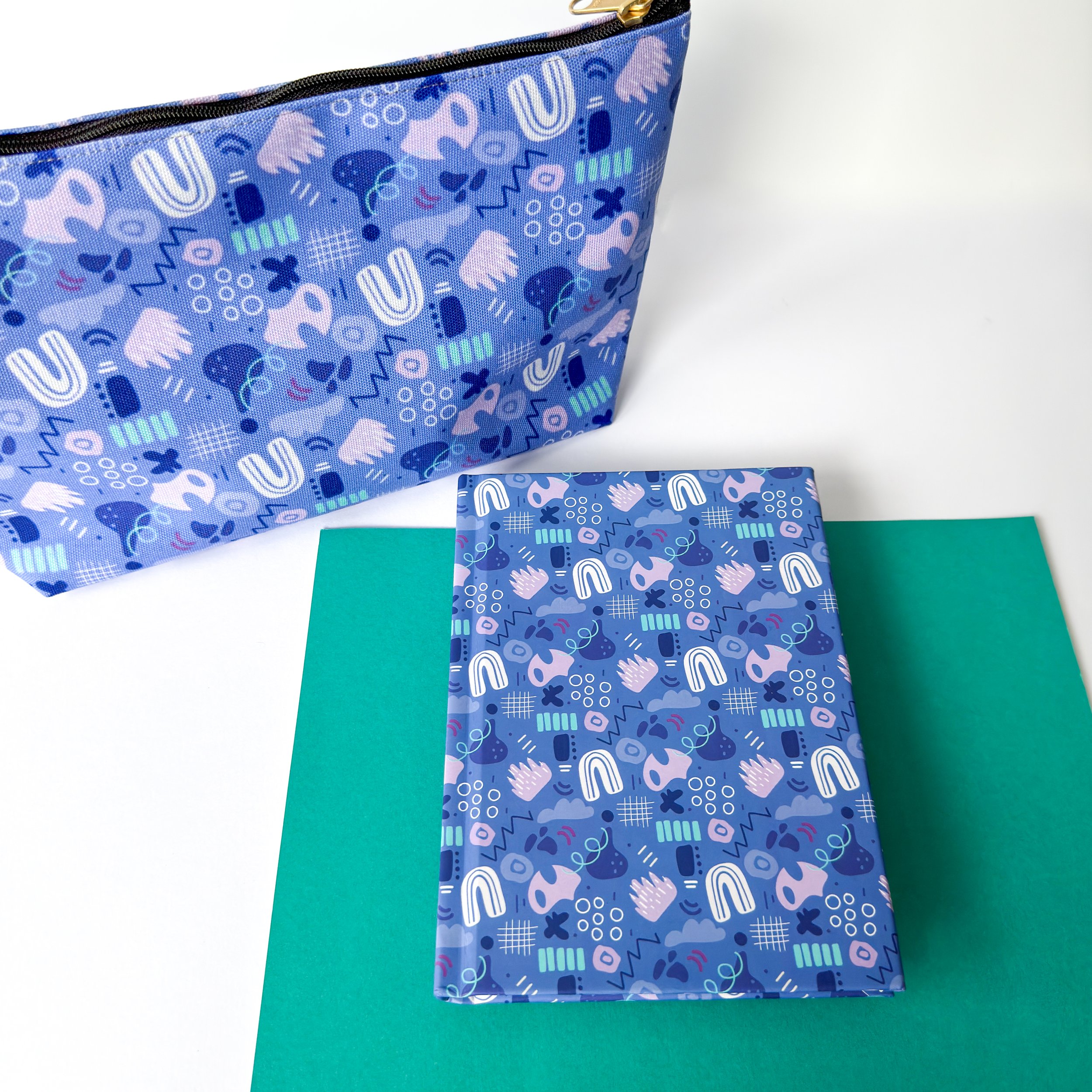 abstract shapes and lines pattern in a fabric pouch perfect for gifting, traveling and as a pencil case