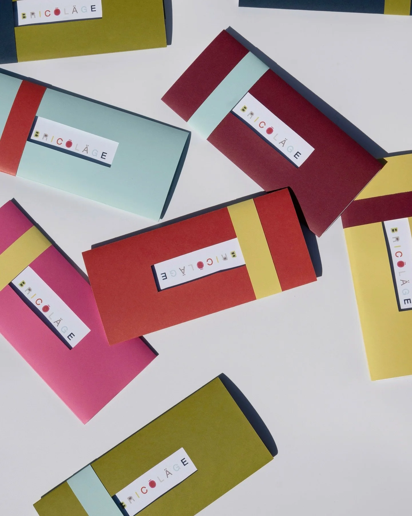 A peek at a project from the Bricolage studio: z-folded discovery brochures designed by Cat; sealed up in hand cut envelope sleeves in a few of our favorite colors (aka all of the colors.)