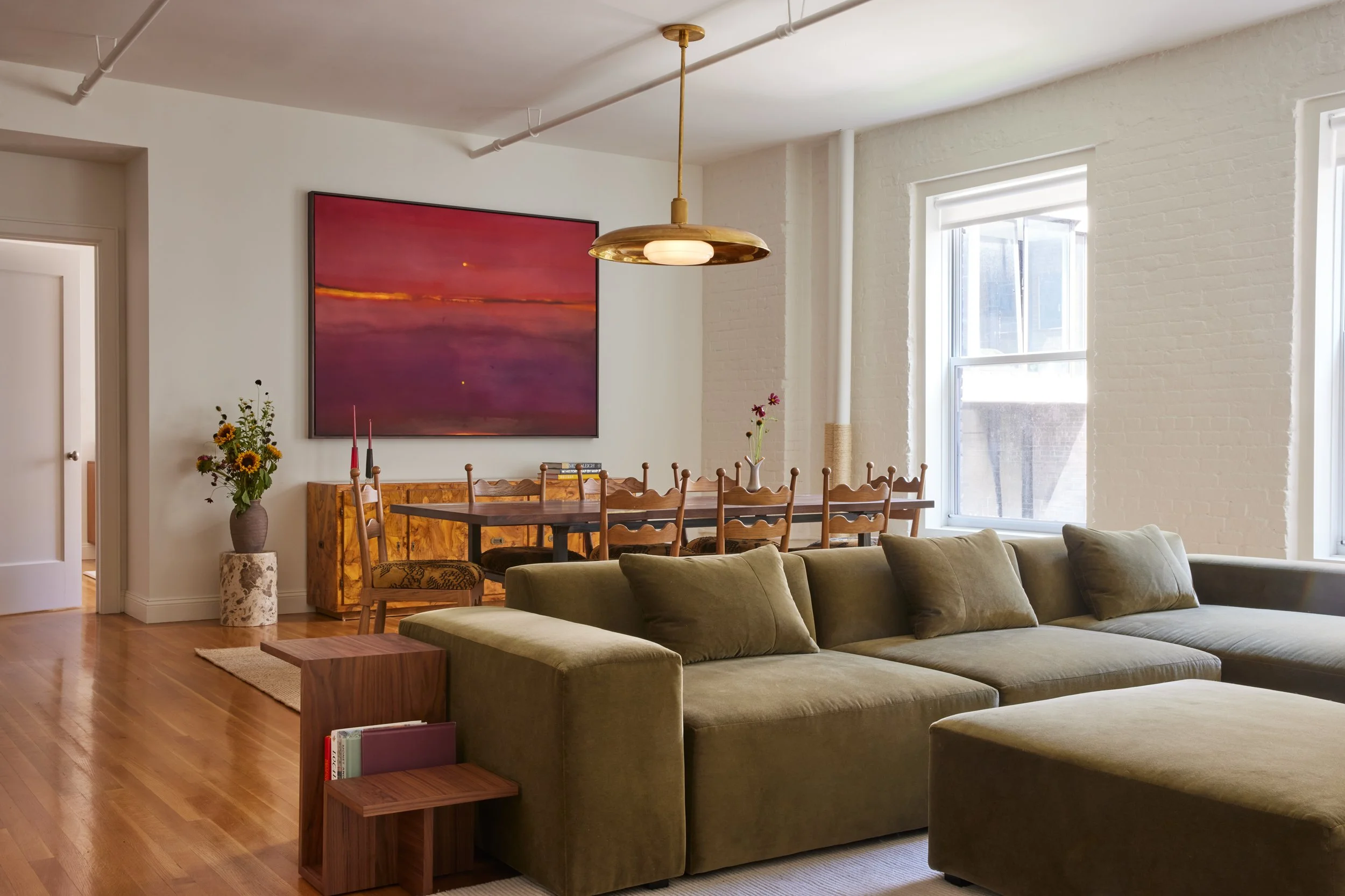 ARowley_IsabellaCarlucciArch_30West13thSt_0224_LivingIntoDining_LightOff_Flowers_Mid_LightOn_retAR.jpg